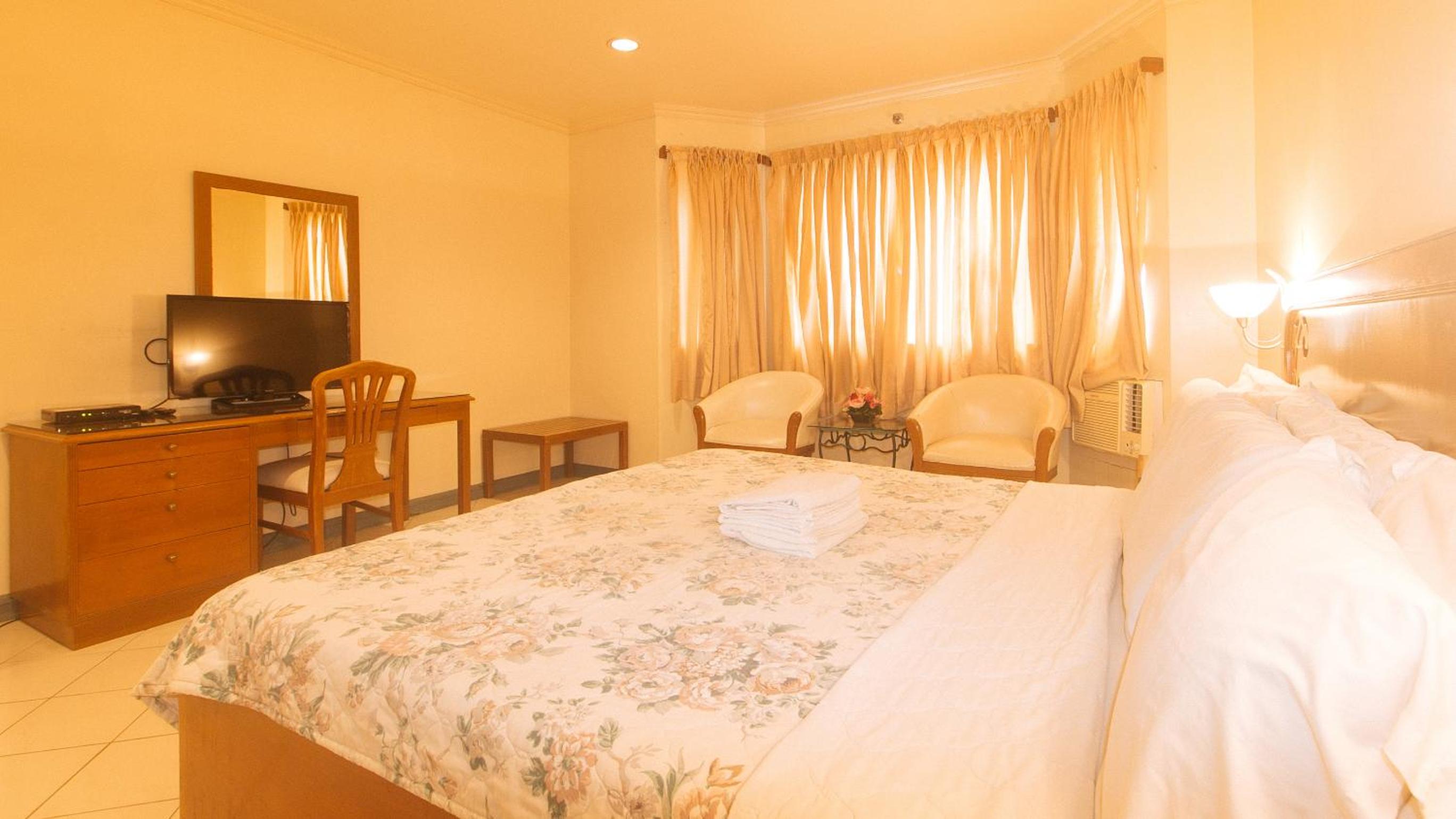 Deluxe Room - Photo 11