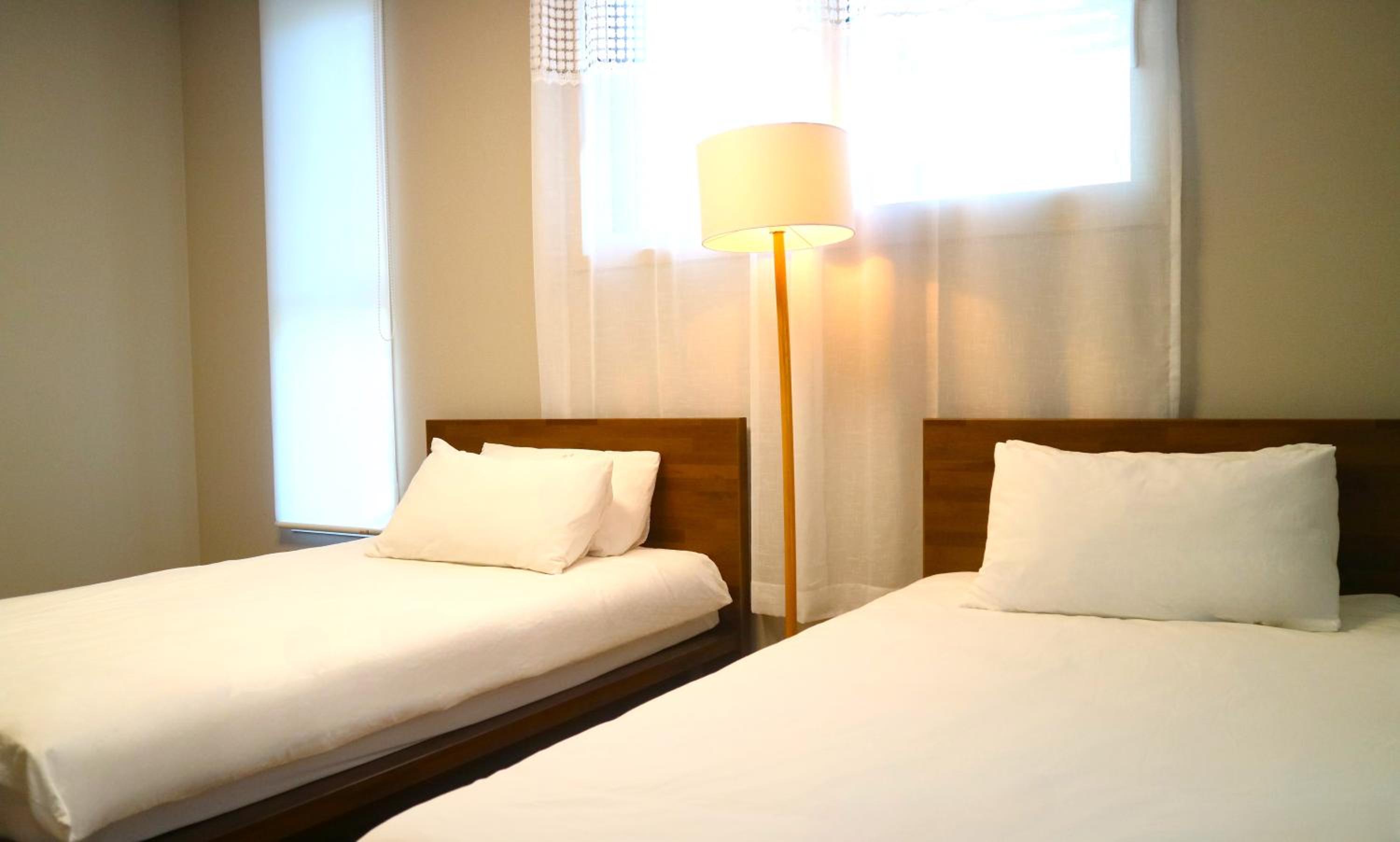 Twin Room with Private Bathroom - Photo 1