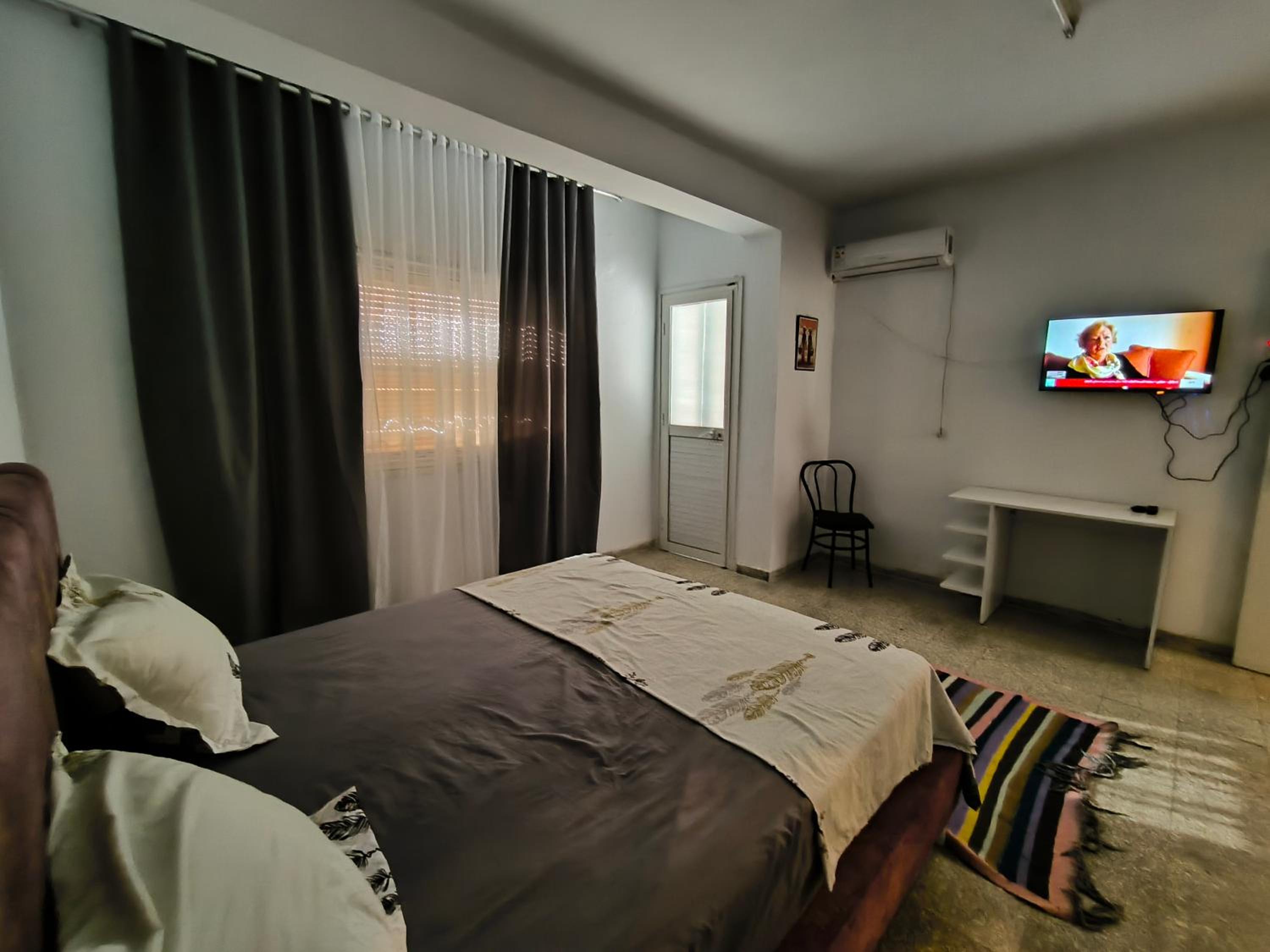 Three-Bedroom Apartment photo 1
