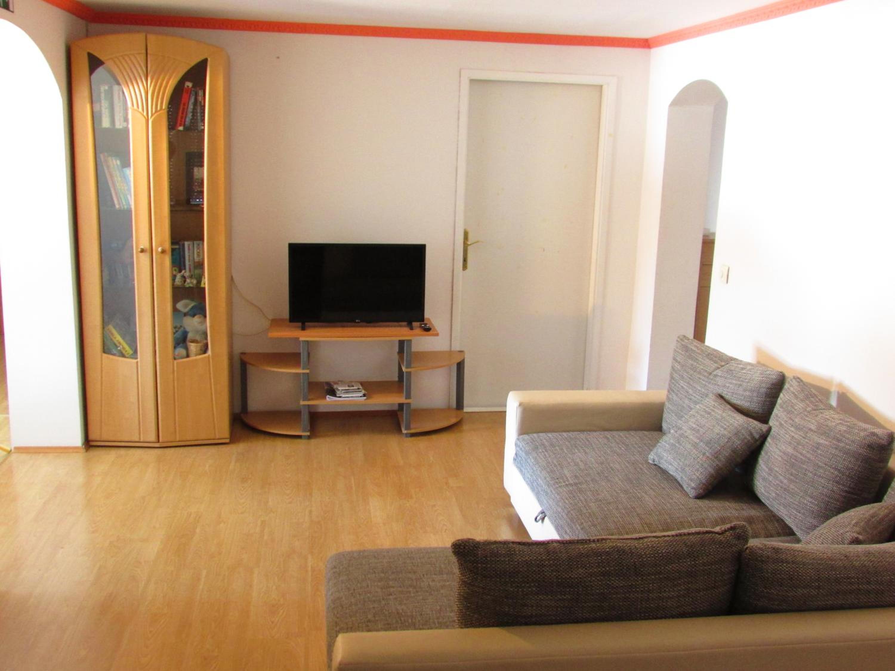 Apartment with Balcony - Photo 2
