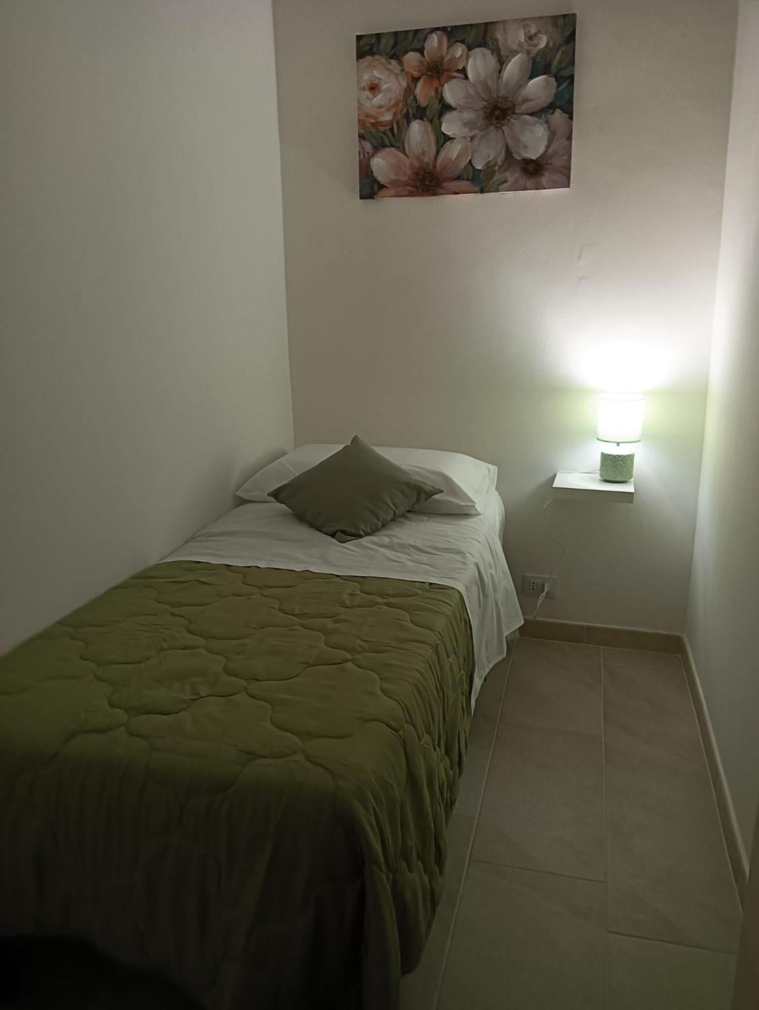 Quadruple Room with Private Bathroom