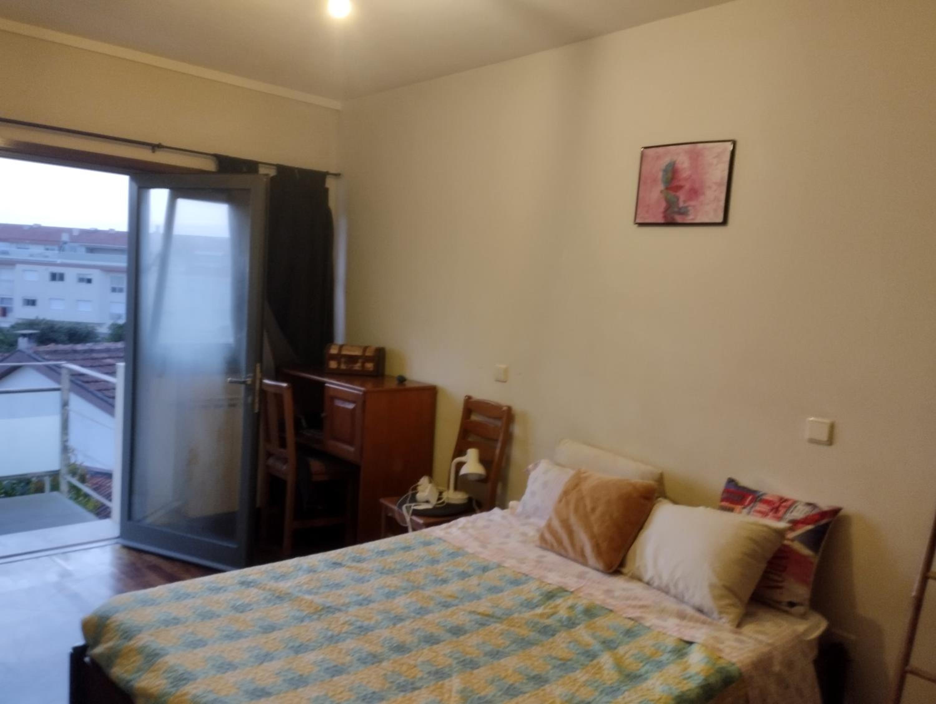 Basic Double Room with Balcony and Shared Bathroom