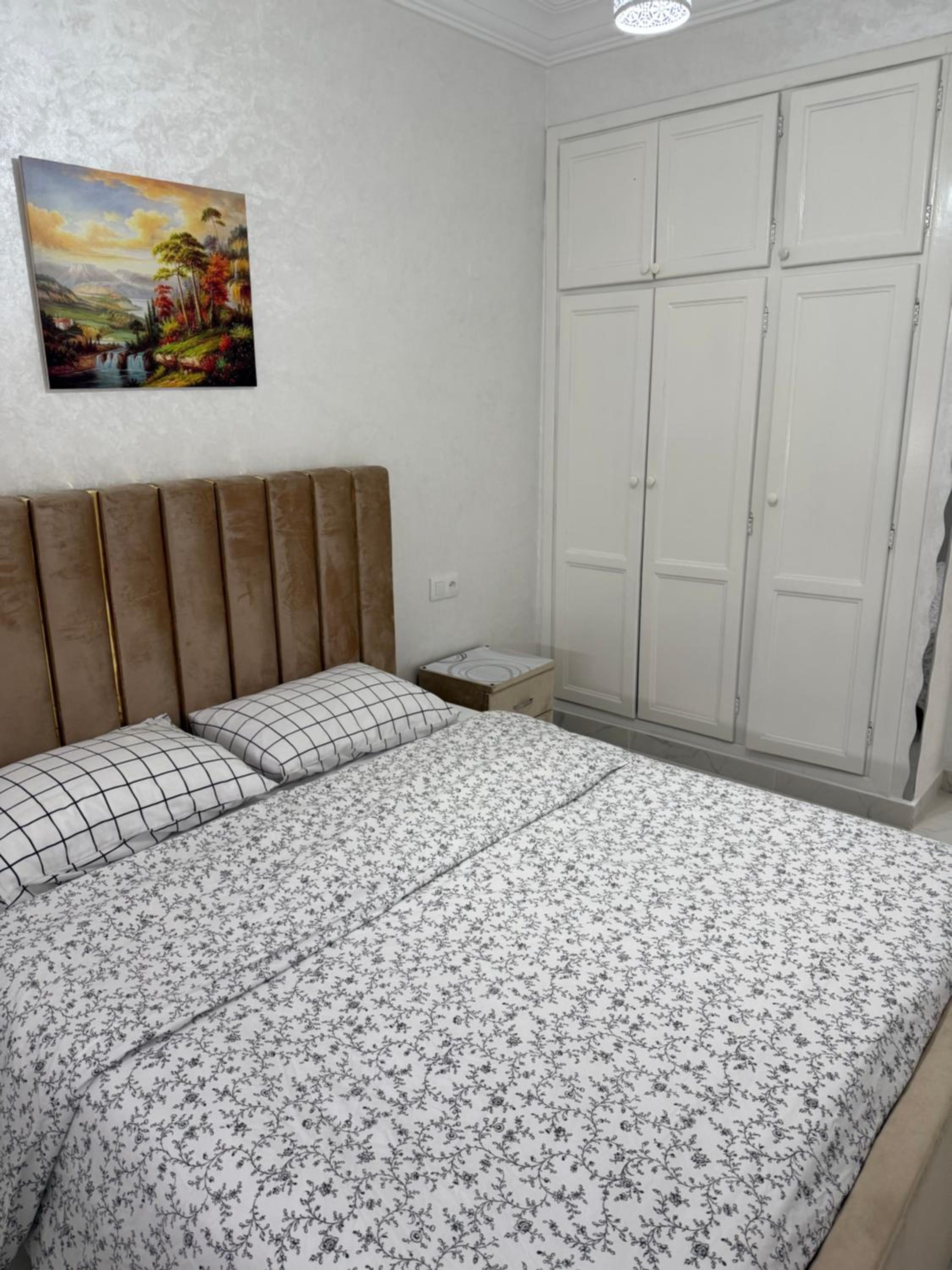 Three-Bedroom Apartment photo 1