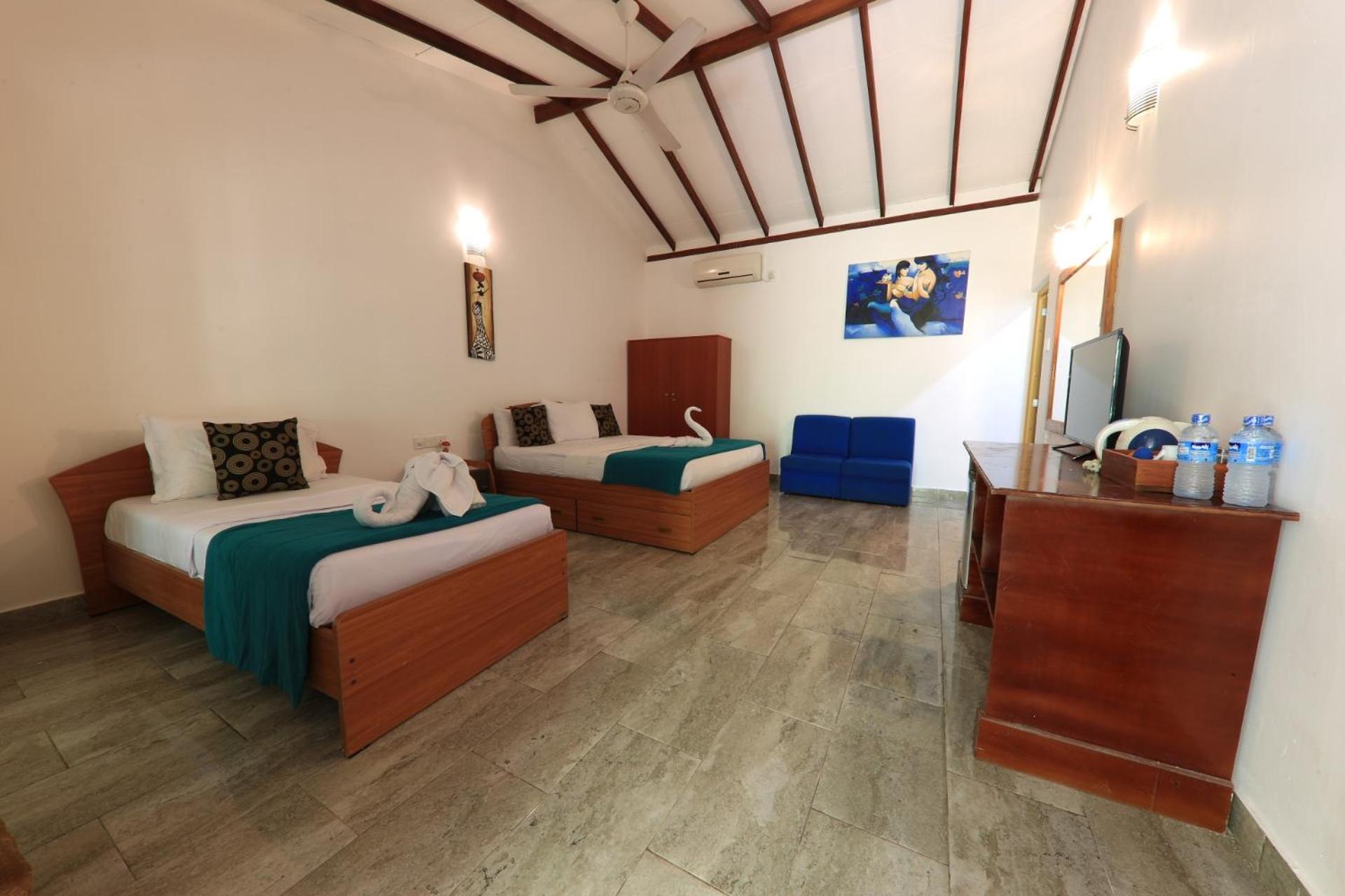Chambre Triple avec Balcon