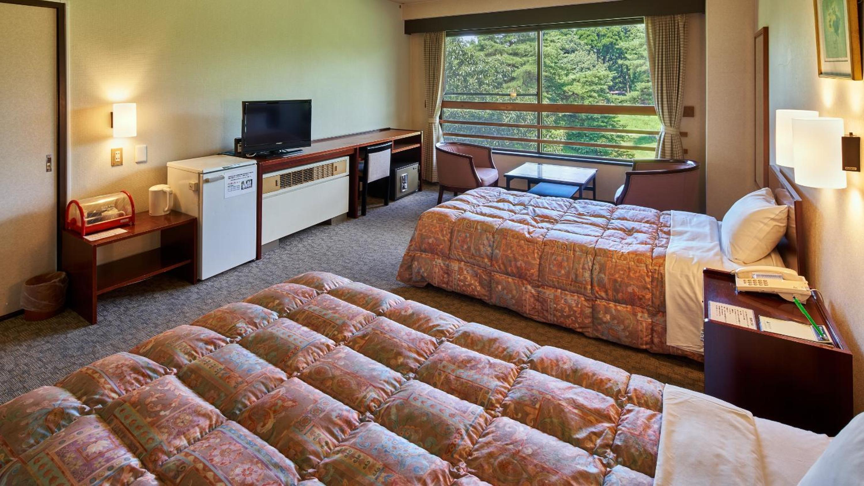 Twin Room - Photo 2