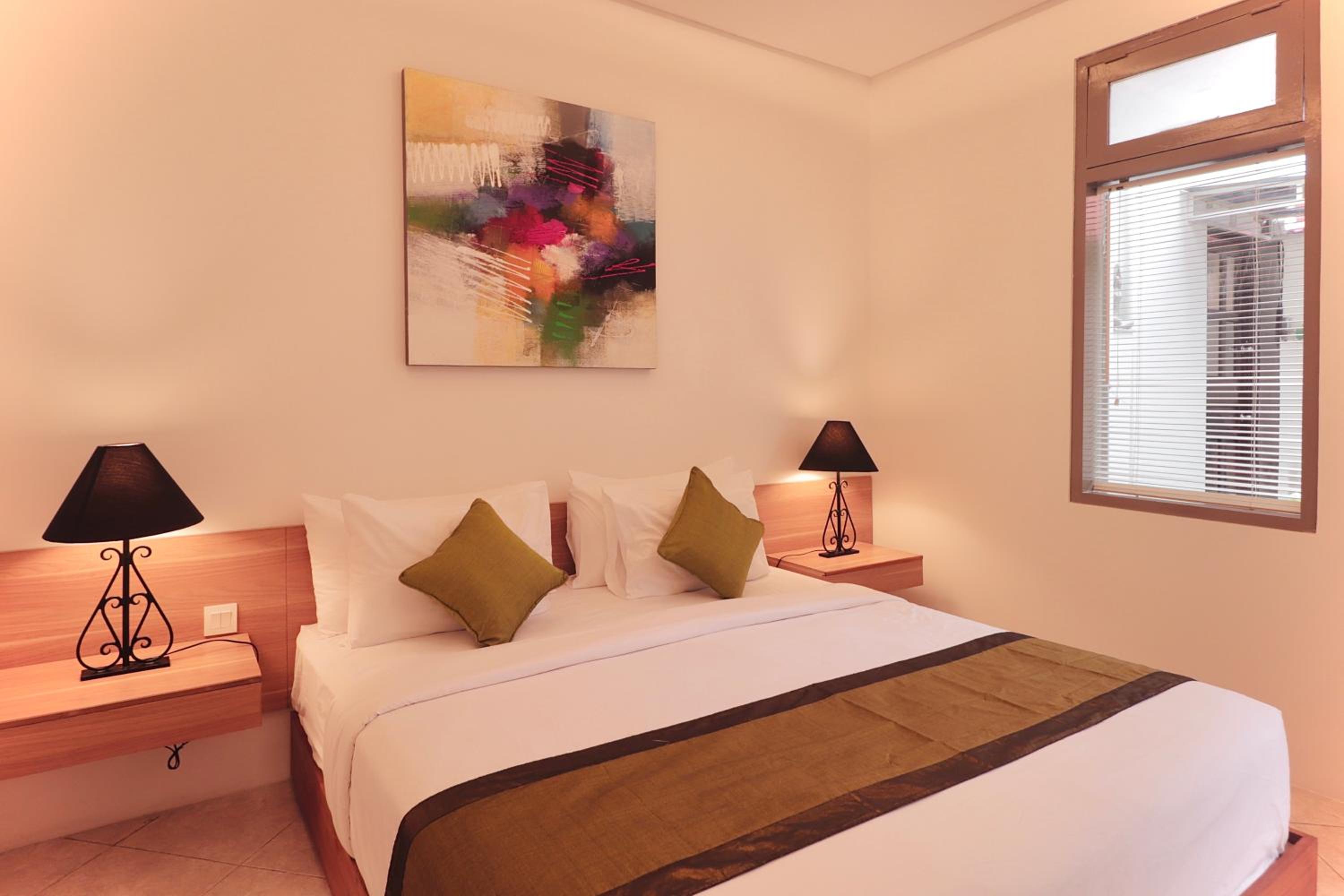 Deluxe Room - Photo 1