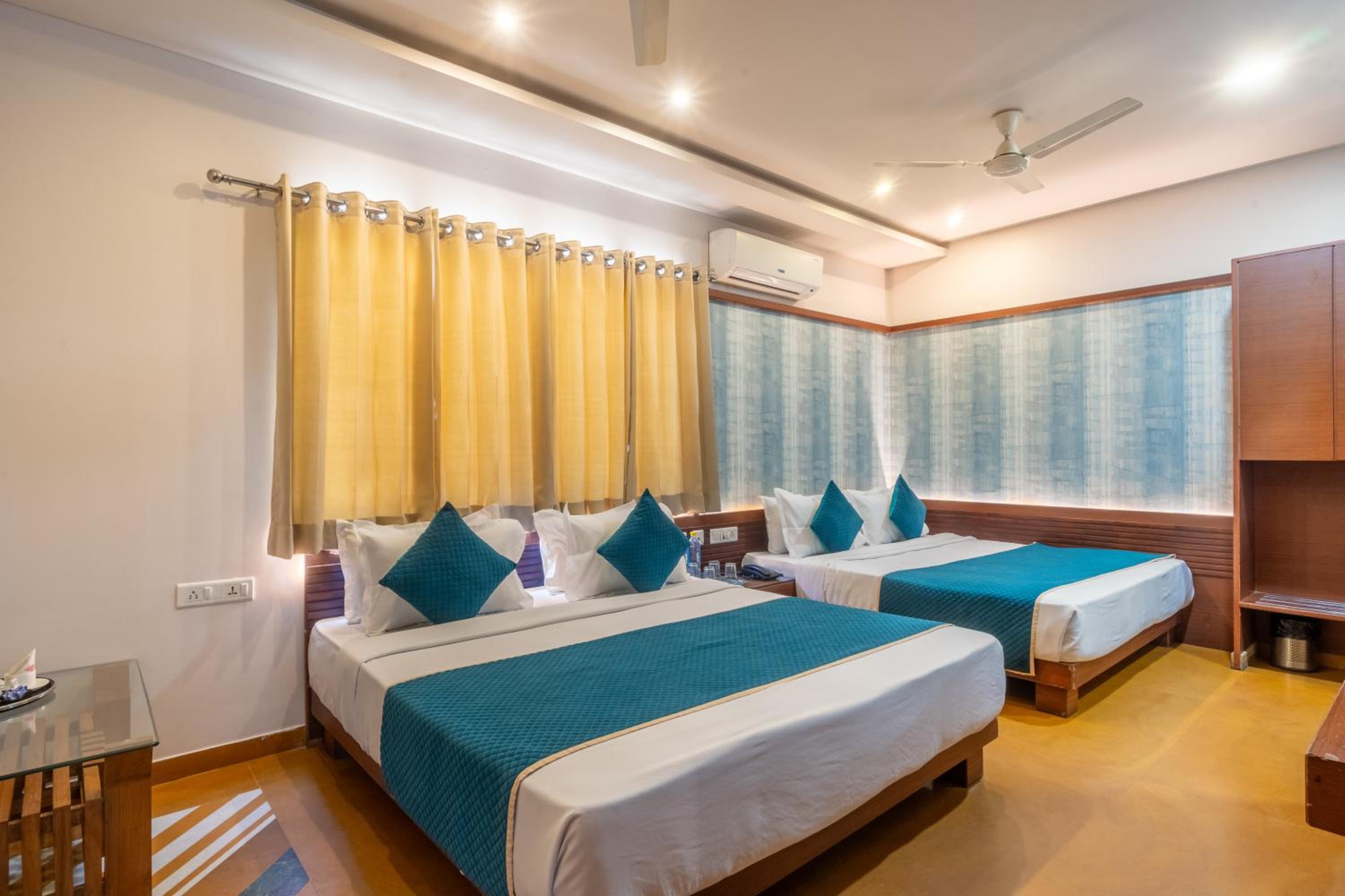 Deluxe Family Room (Sanitized): 20% Off on Room Upgrade (SAV), 40% Off on Meal Upgrade, 15% off on Two-way Airport Transfer, 10% off on Two-way Railway Station Transfer, Bus Stop Transfers