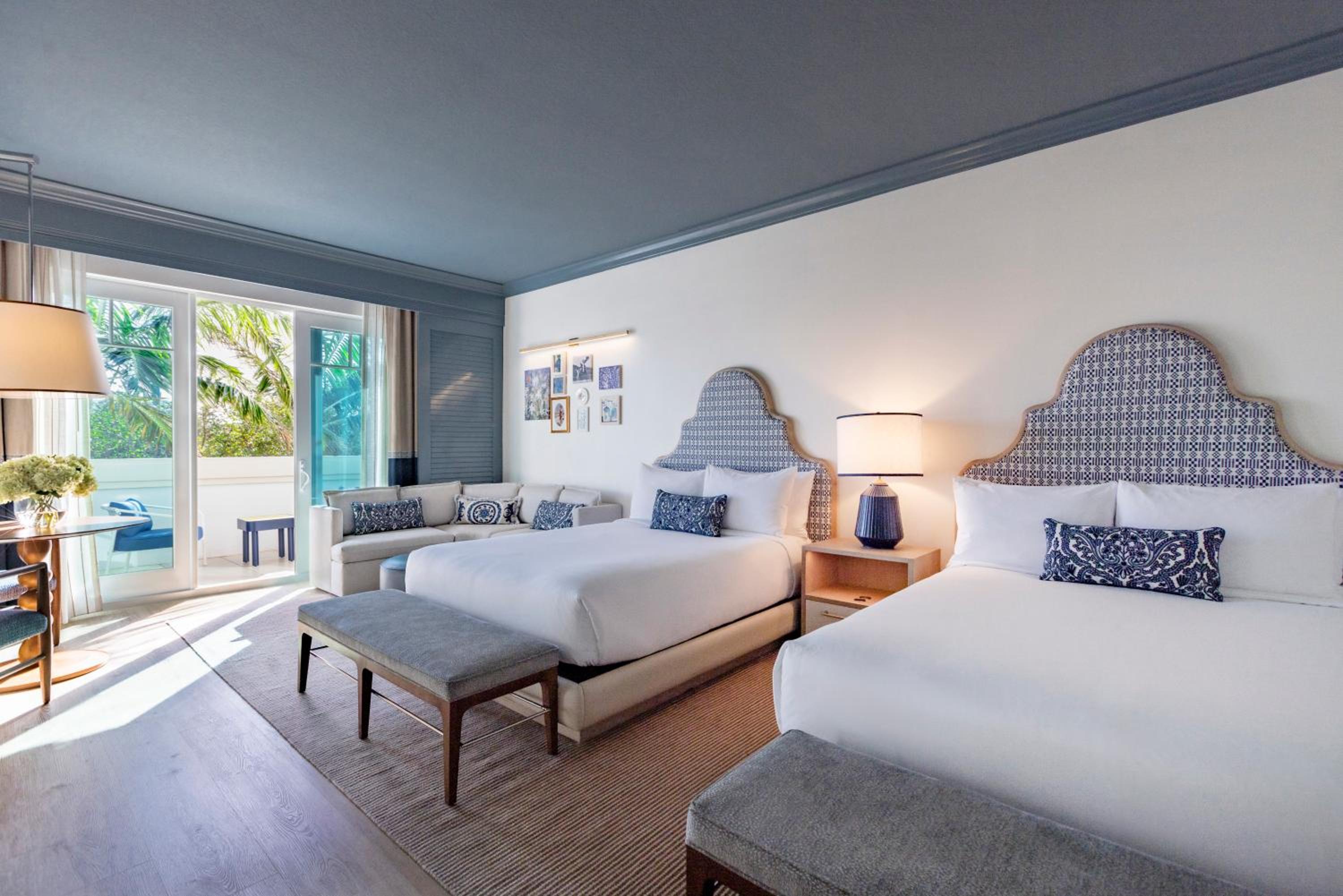 Deluxe Queen Room With Two Queen Beds And Balcony - Photo 1
