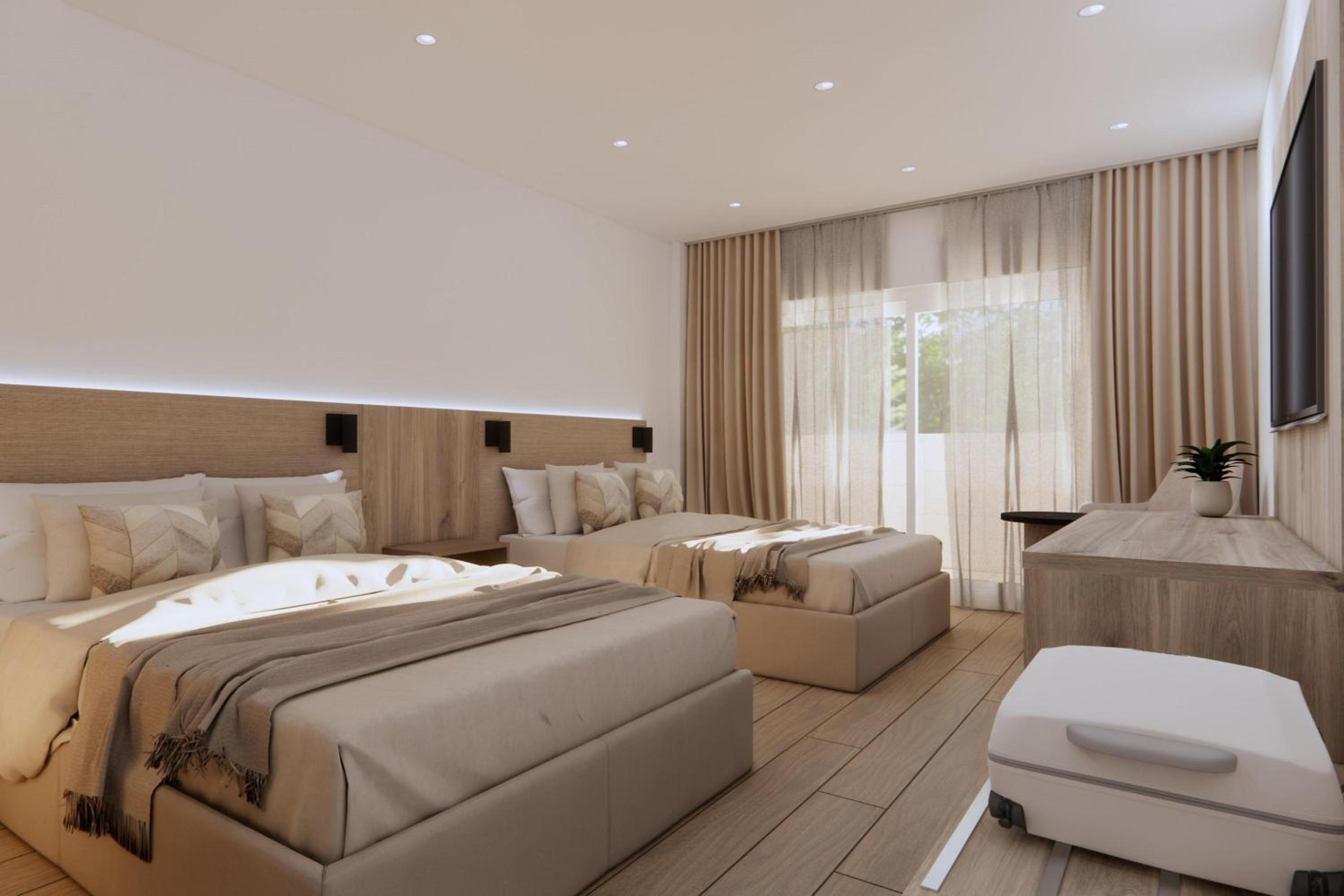 Standard Double Room (2 Adults + 1 Child) photo 2