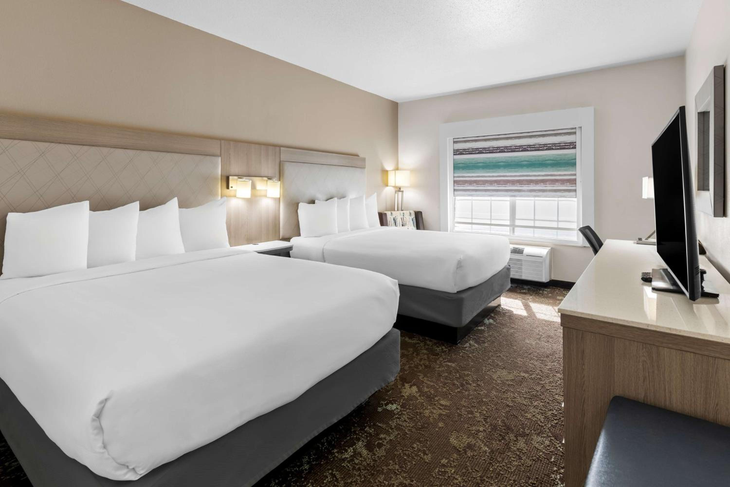 Queen Room with Two Queen Beds - Photo 1