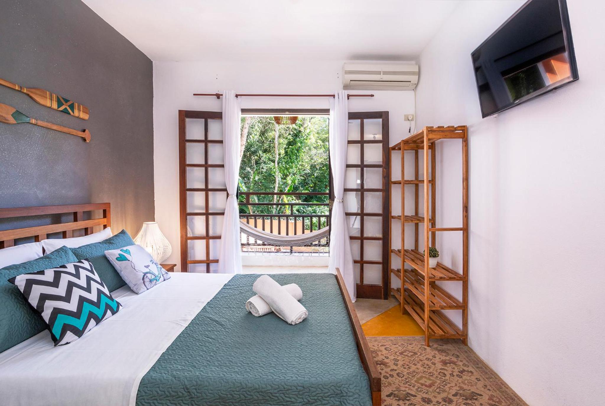 Quarto Duplo com Varanda Superior