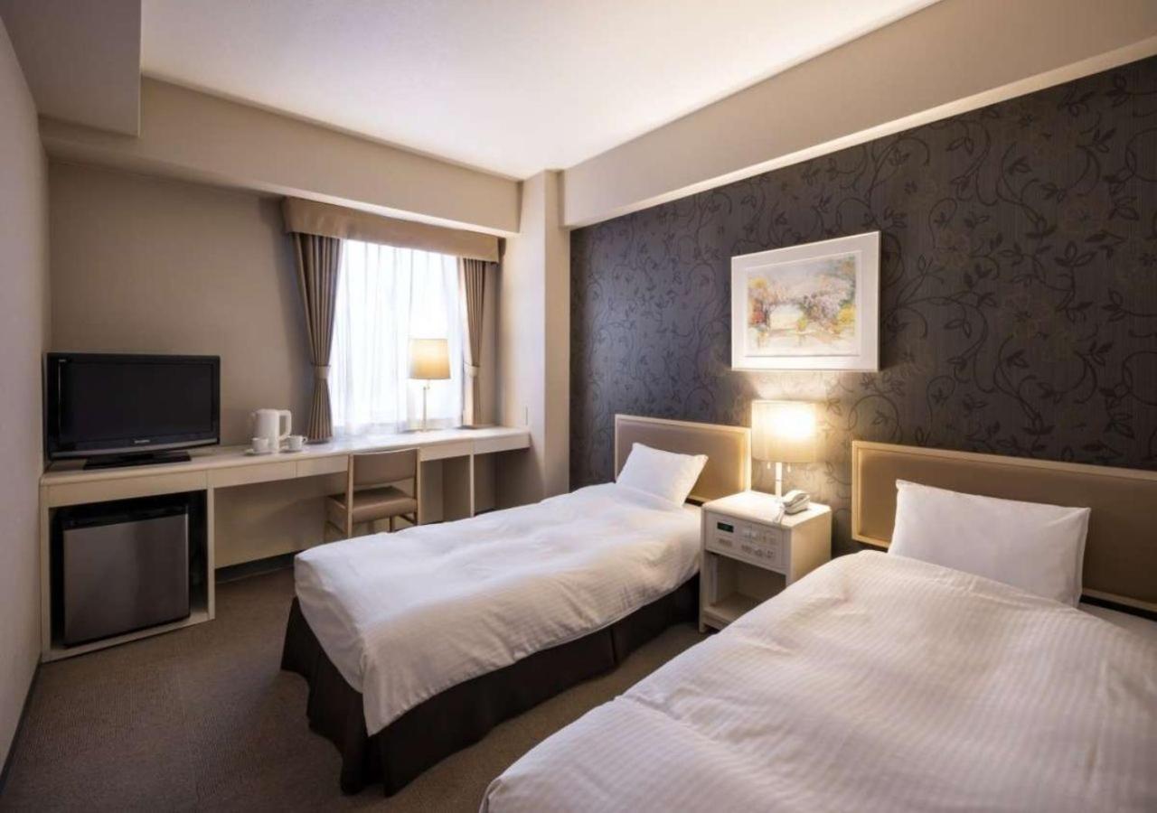 Twin Room - Non-Smoking - Photo 3