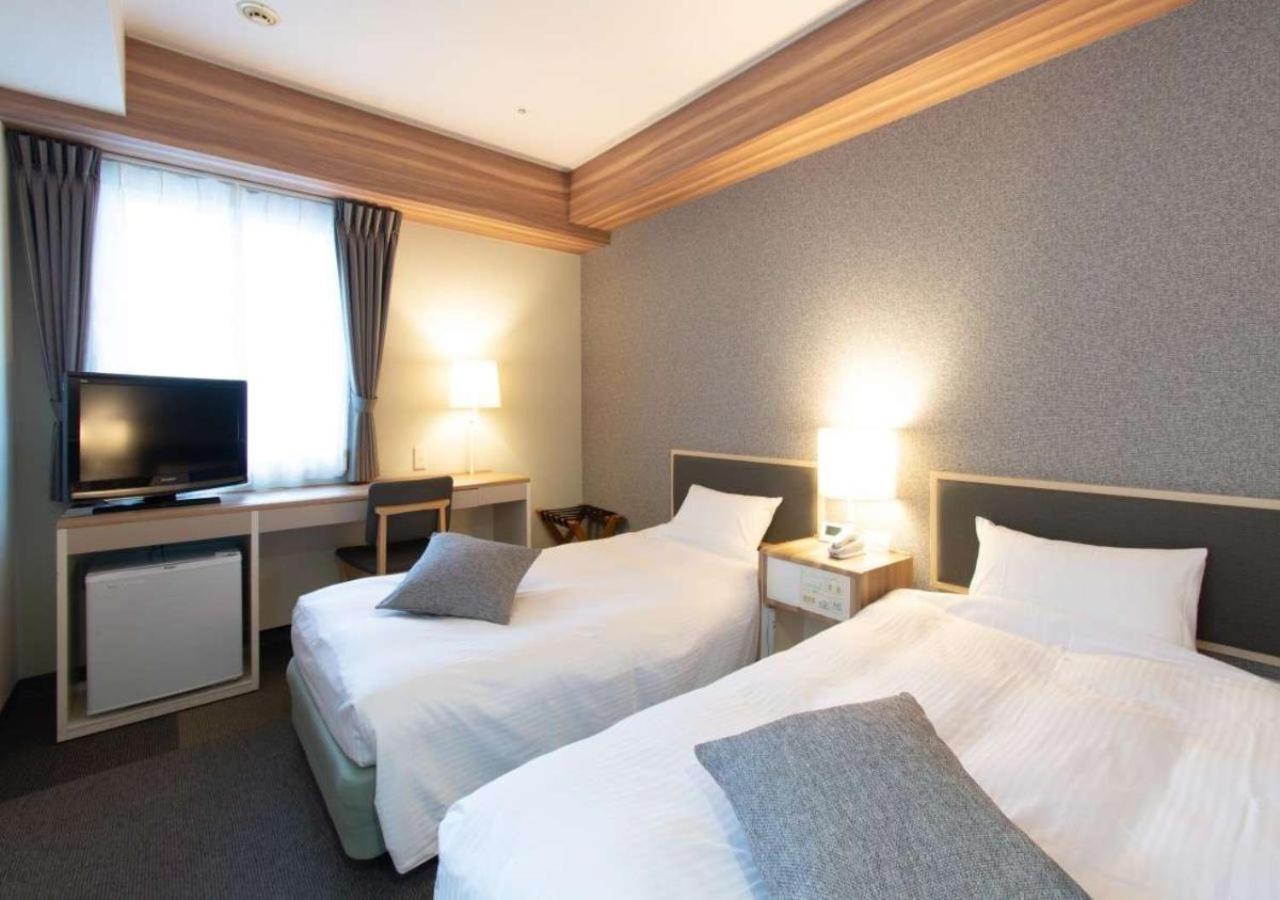 Twin Room - Non-Smoking - Photo 1