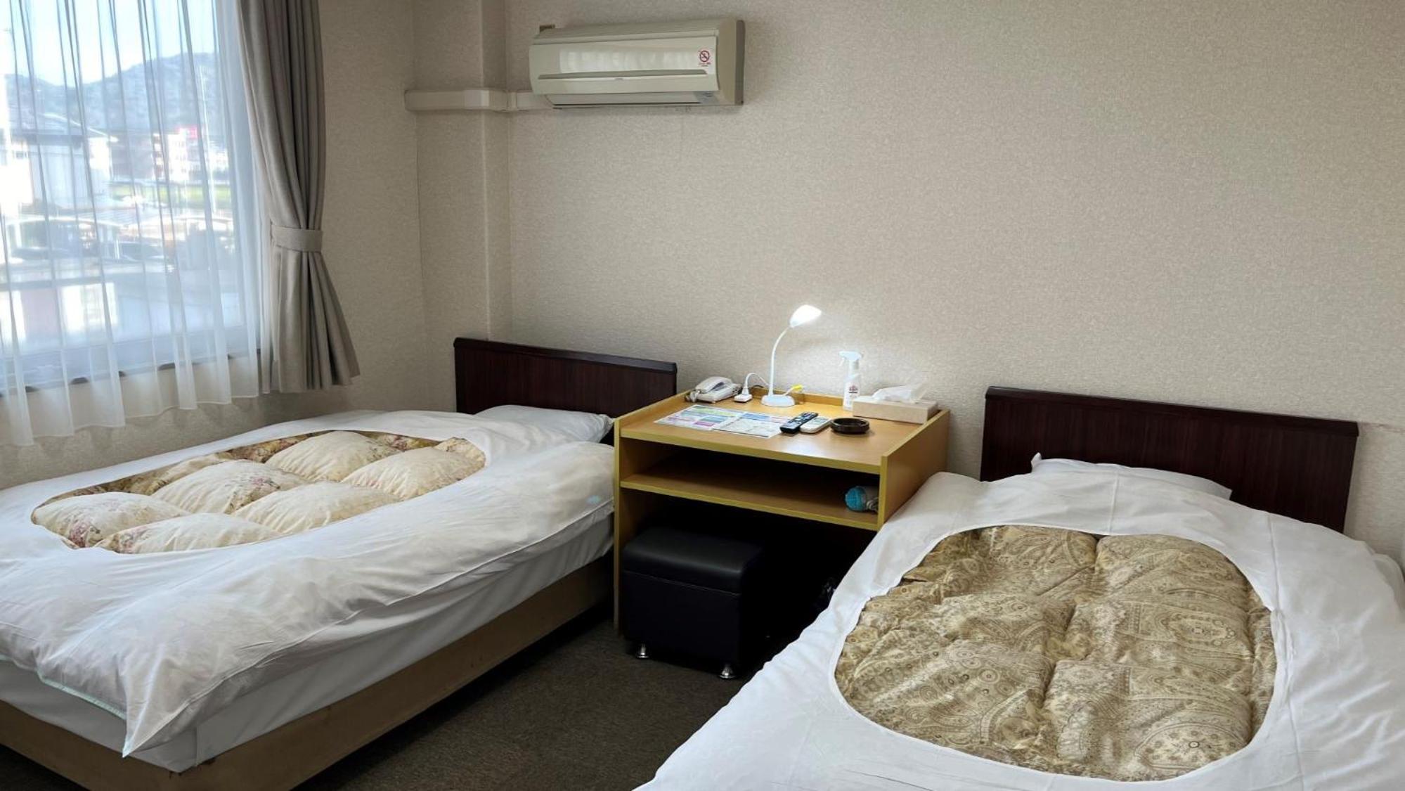 Twin Room - Photo 3