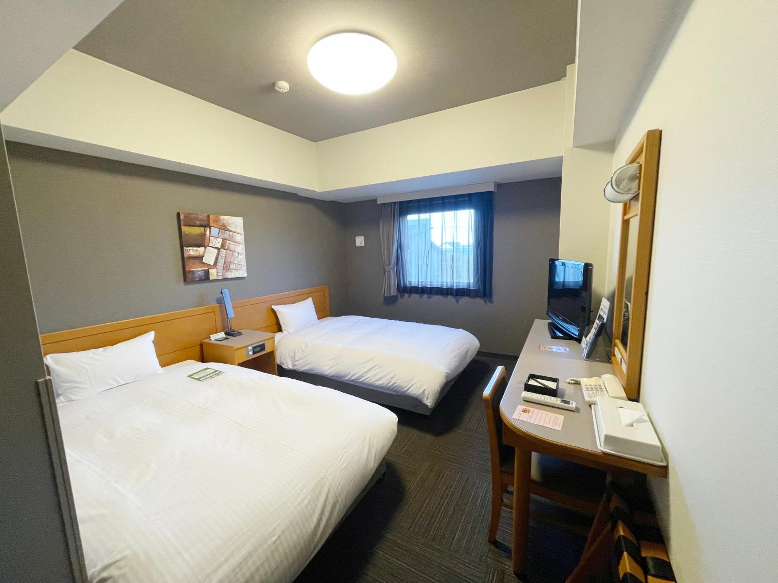 Twin Room - Non-Smoking - Photo 1