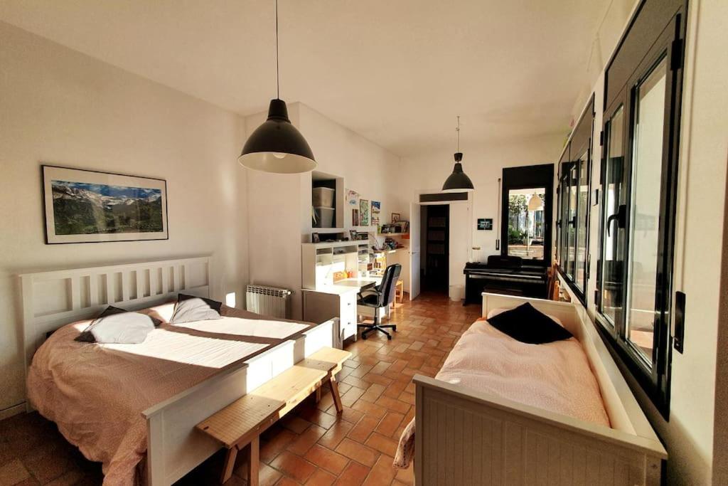 Habitación Cuádruple con Vista al Jardín