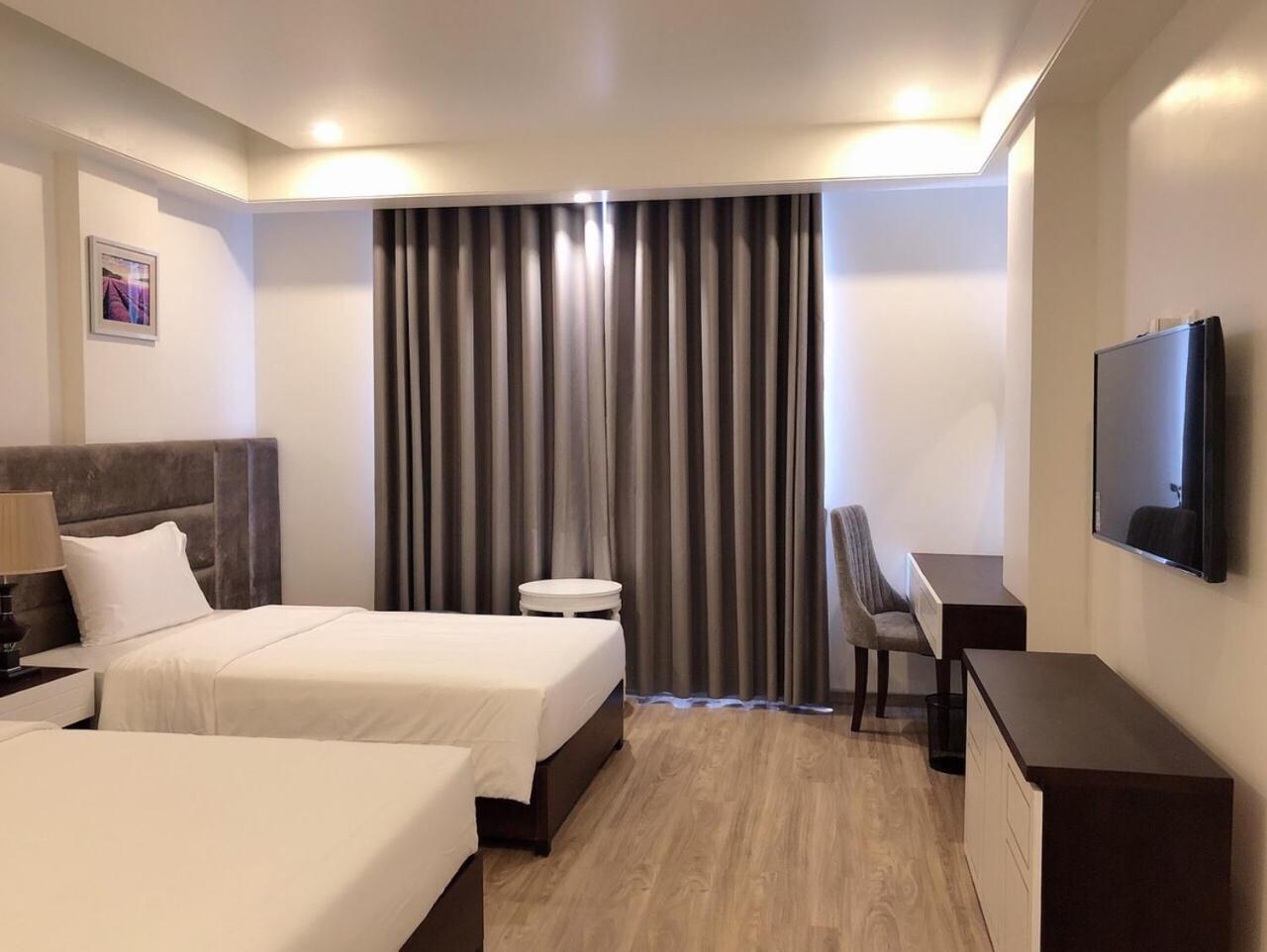 Standard Twin Room - Photo 4