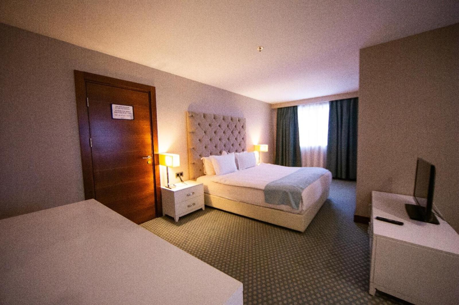 Deluxe Triple Room - Photo 15
