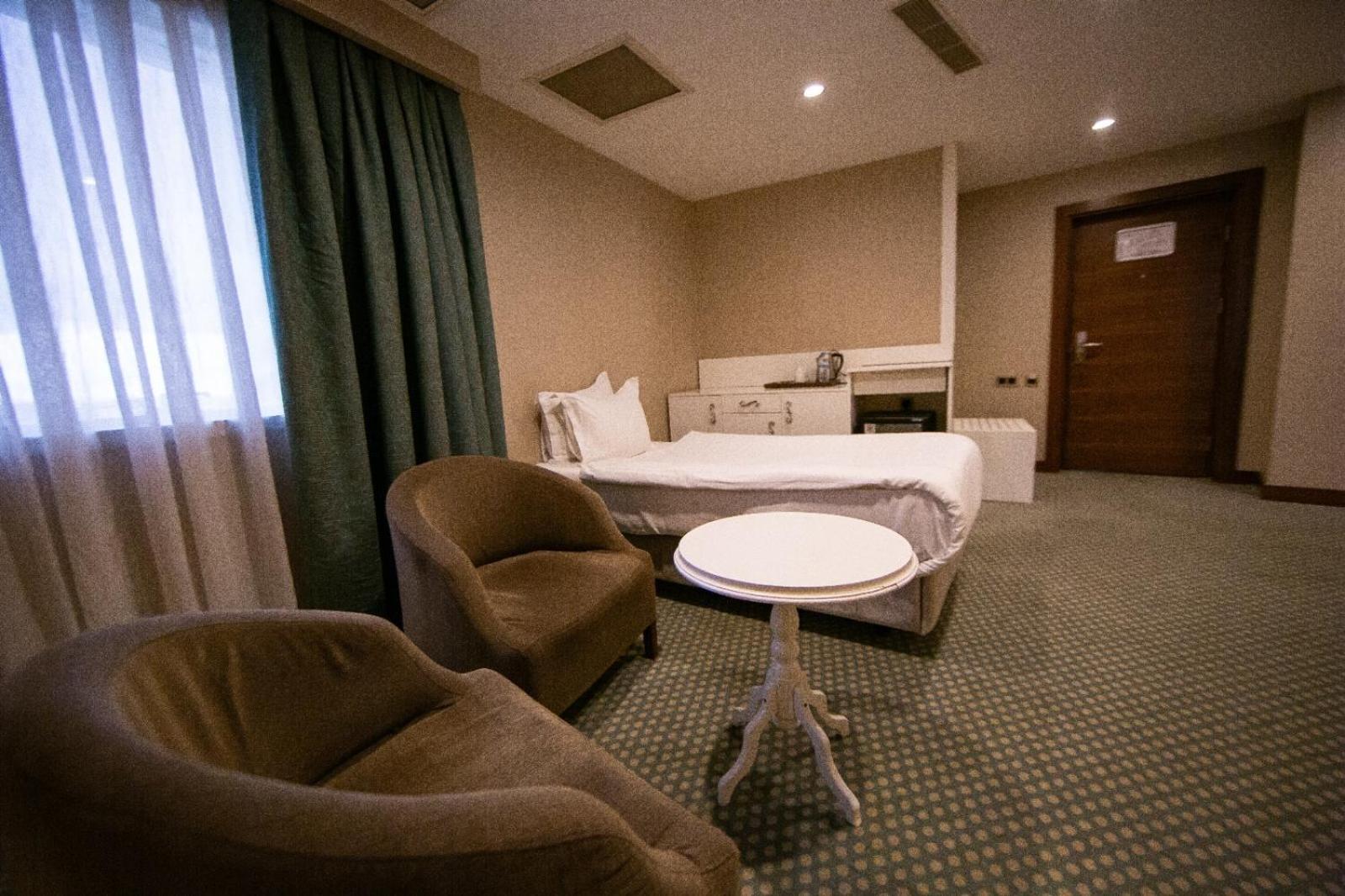 Deluxe Triple Room - Photo 11