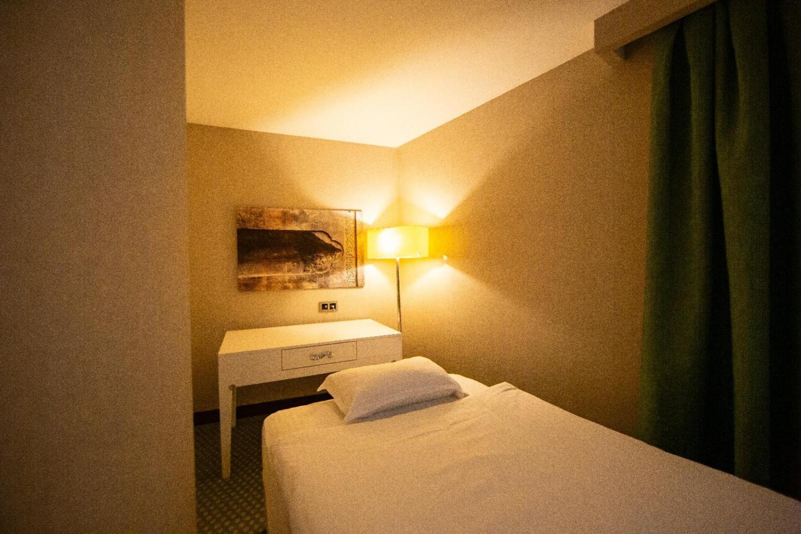 Deluxe Triple Room - Photo 14