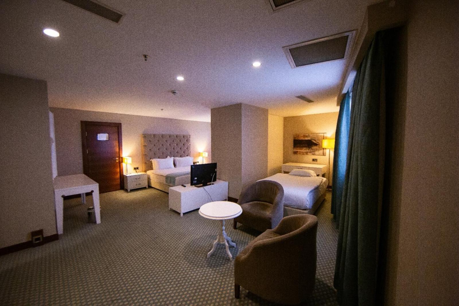 Deluxe Triple Room - Photo 1