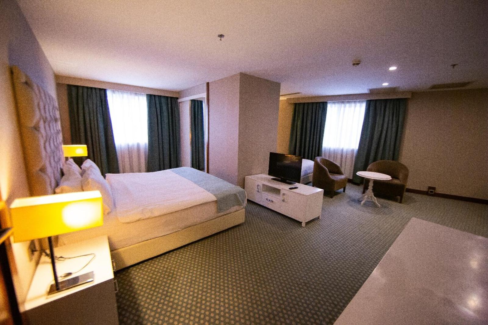 Deluxe Triple Room - Photo 10