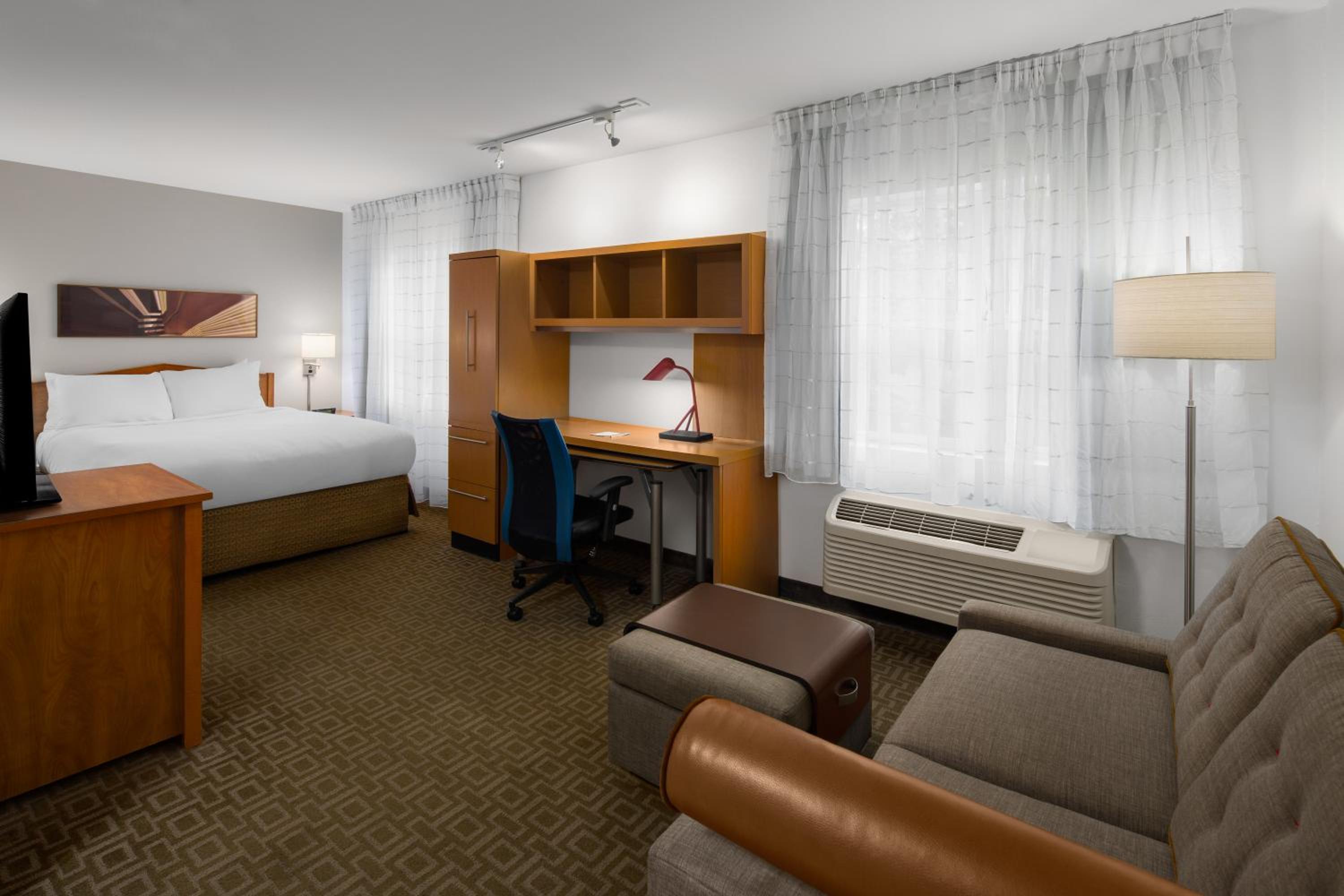 Queen Suite with Sofa Bed and Mobility Accessible Roll-In Shower