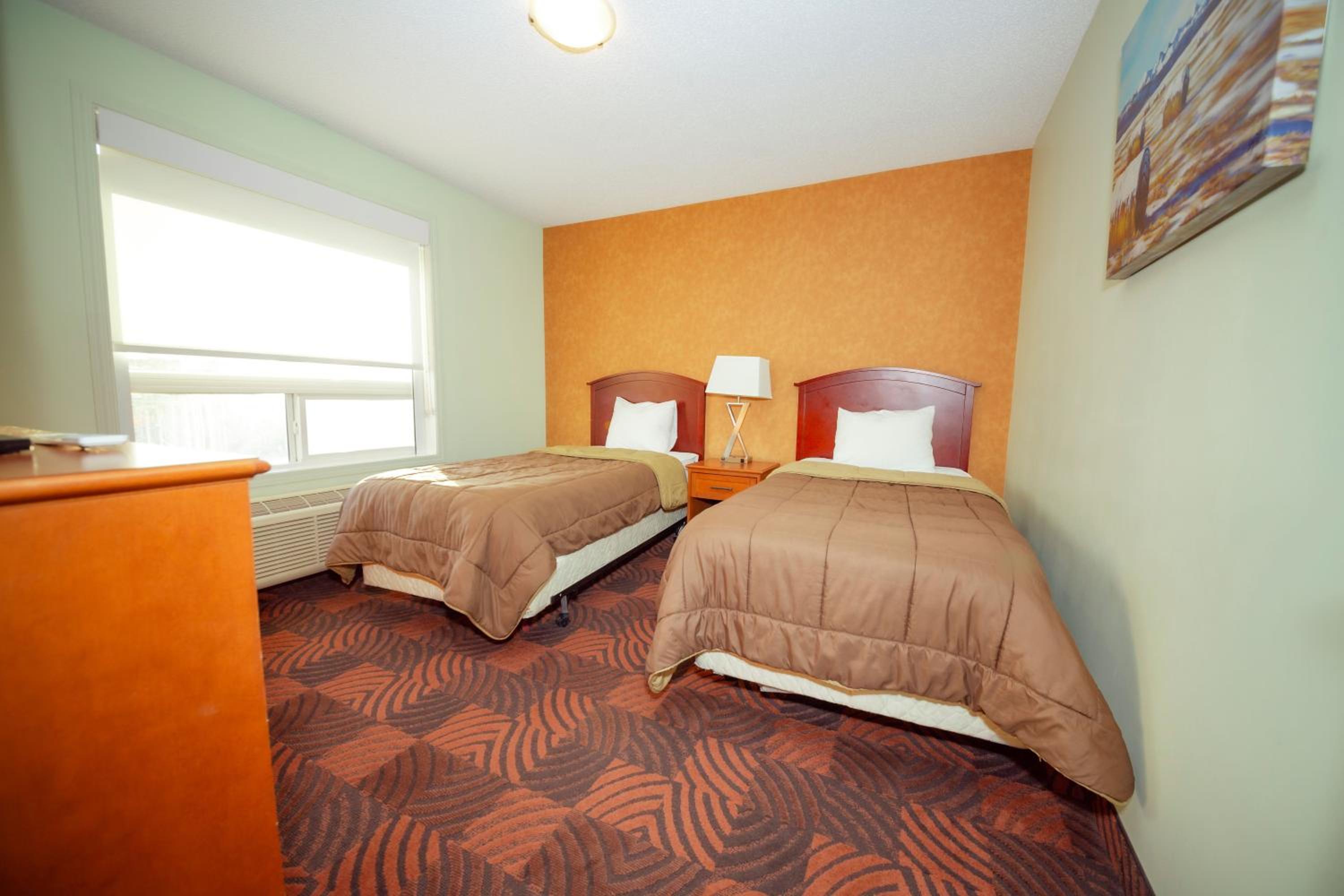 Two-Room King Suite with One King Bed and Two Single Beds - Non-Smoking - Photo 1