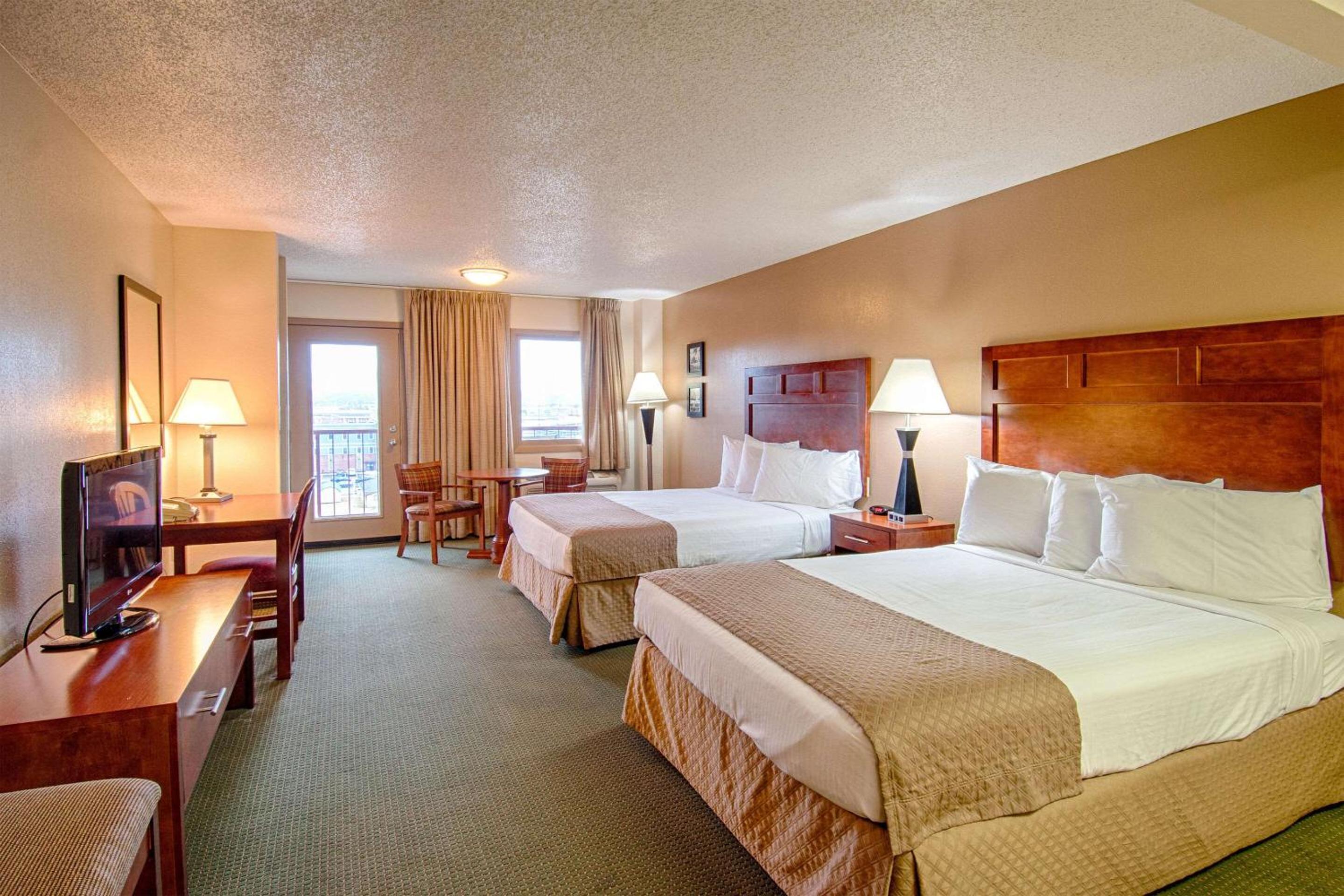 Quadruple Room with Two Queen Beds and Balcony - Non Smoking/Interior Hall photo 2