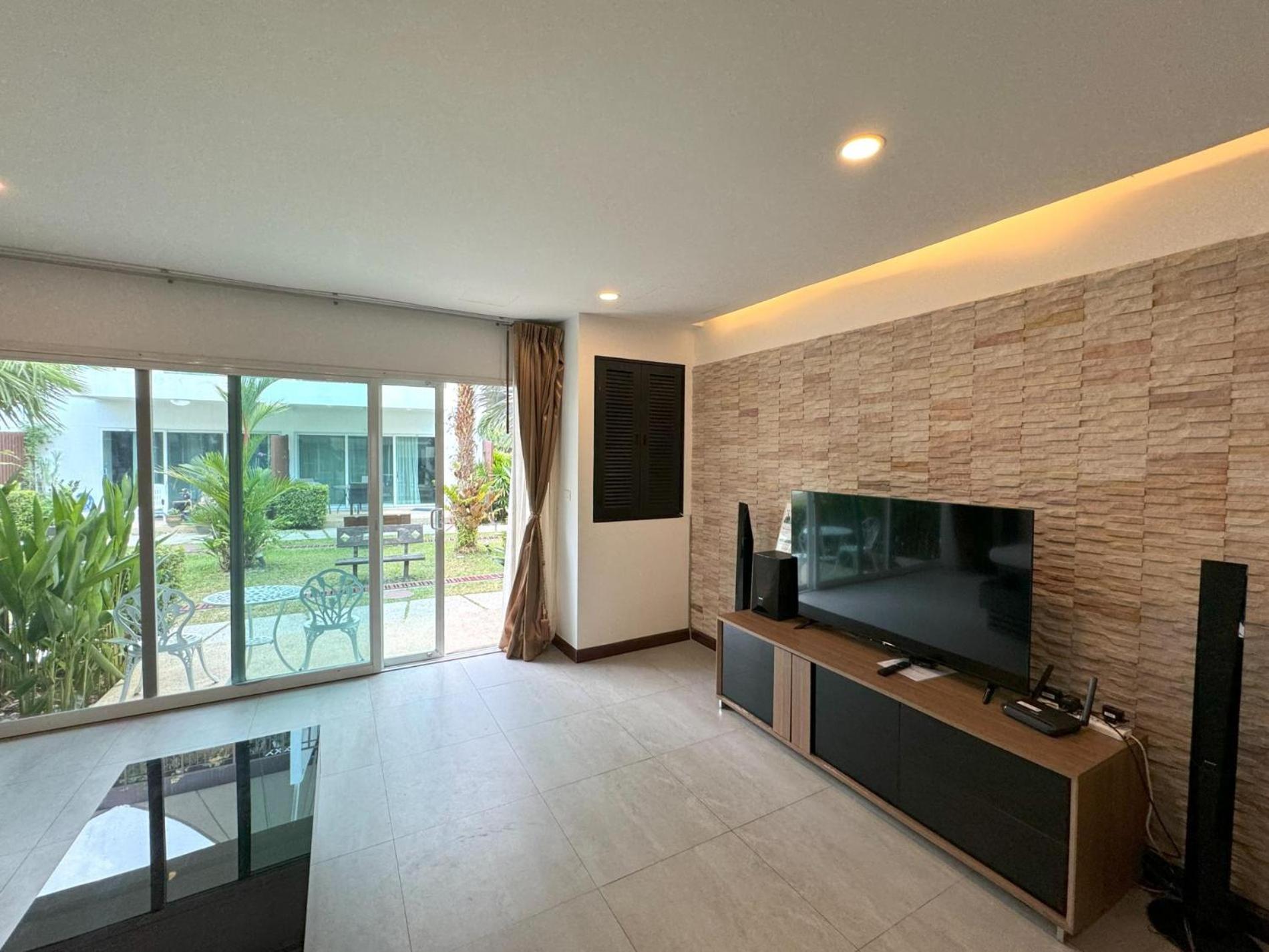 Three-Bedroom House photo 1