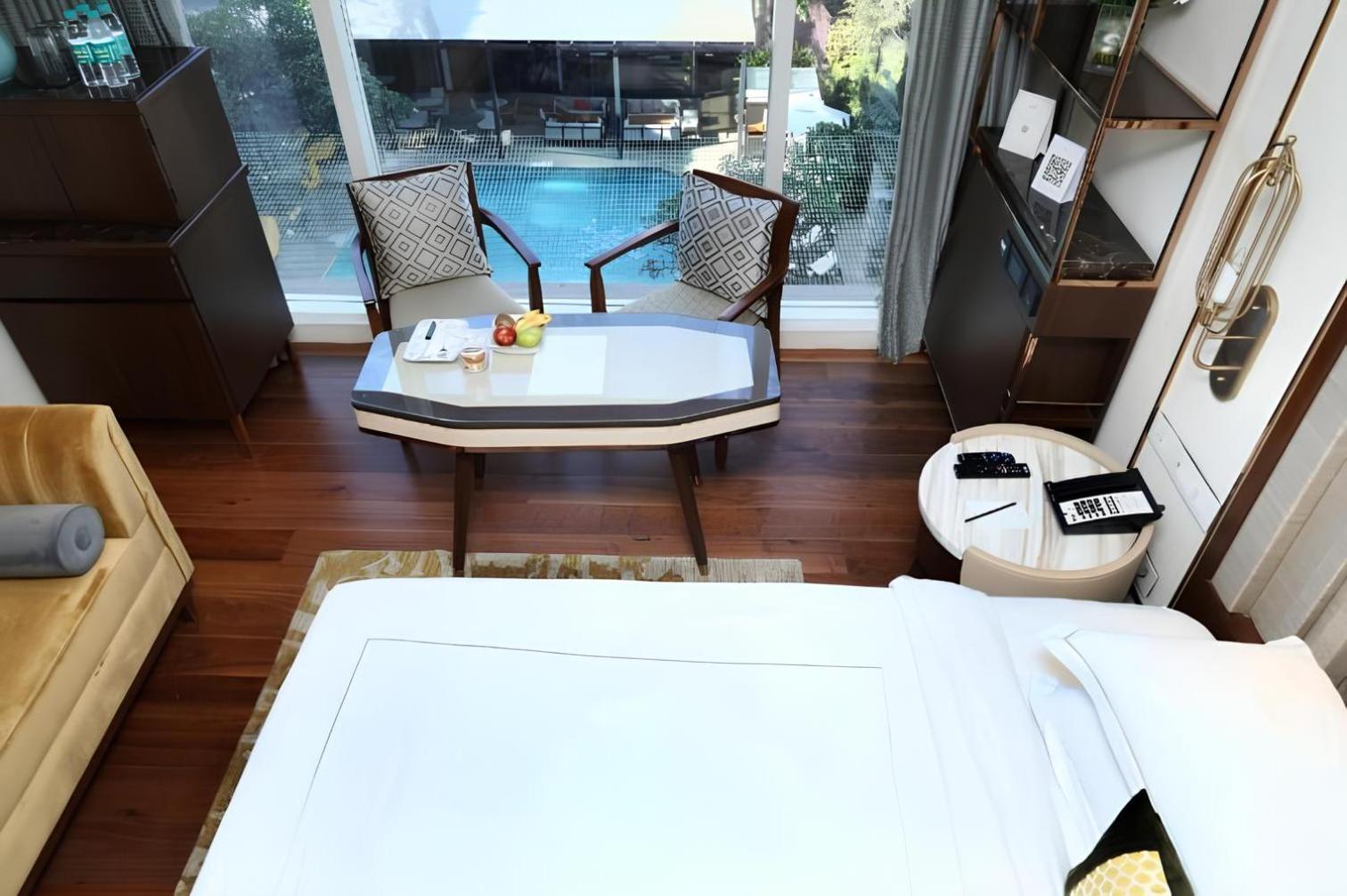 Deluxe Room Pool View King Bed - Photo 1