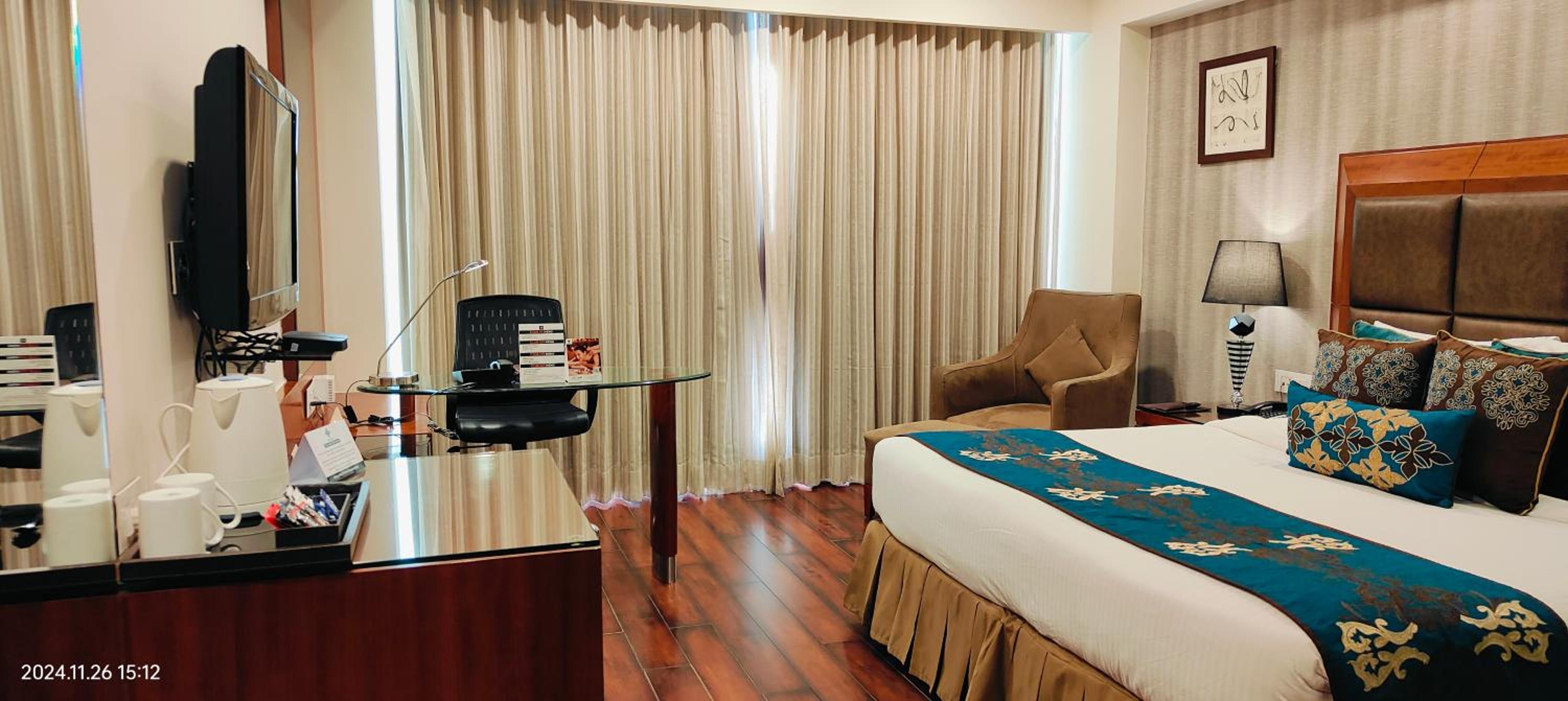 Deluxe Room - Photo 1