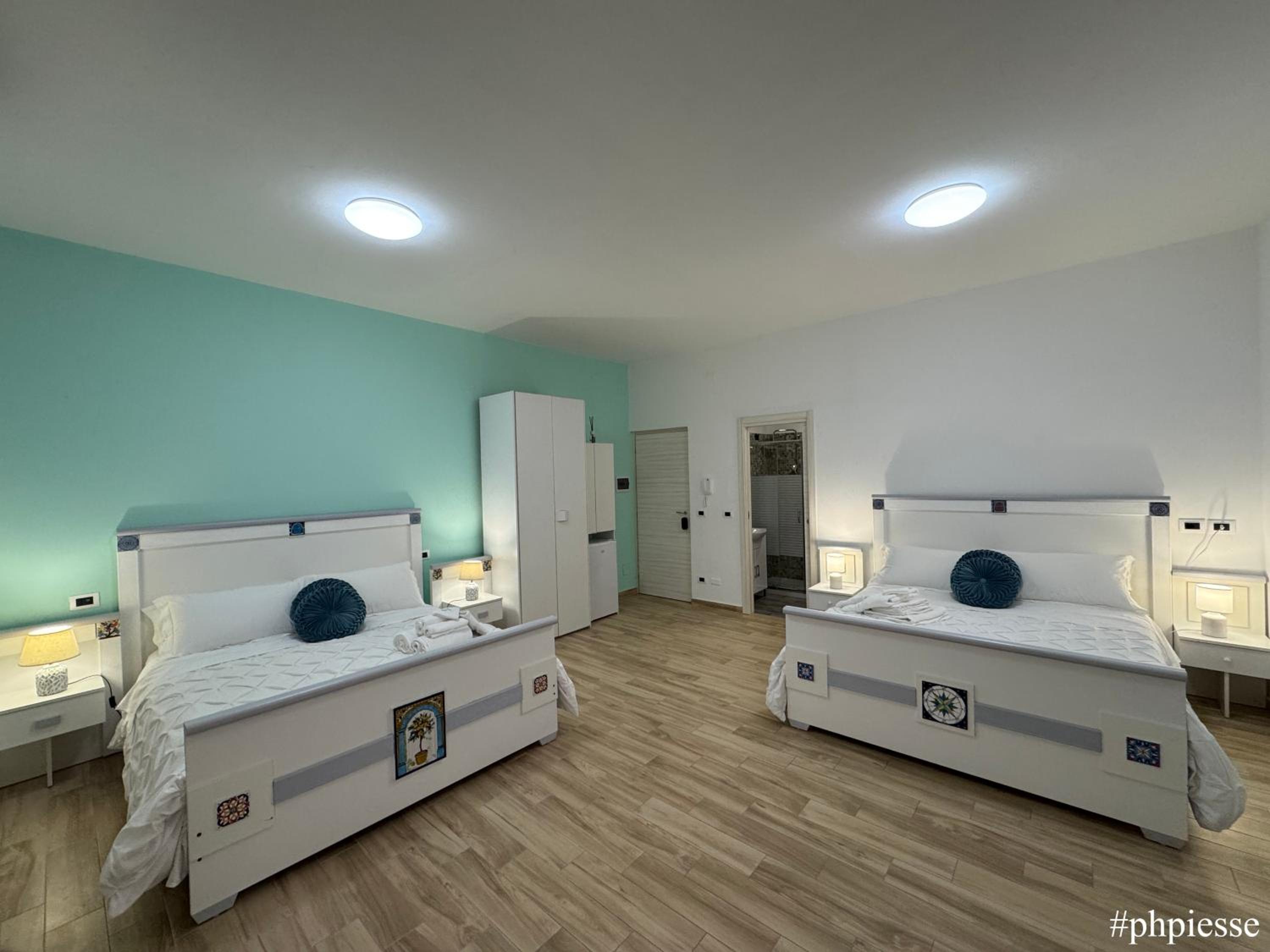 Deluxe Queen Room with Two Queen Beds - Photo 1