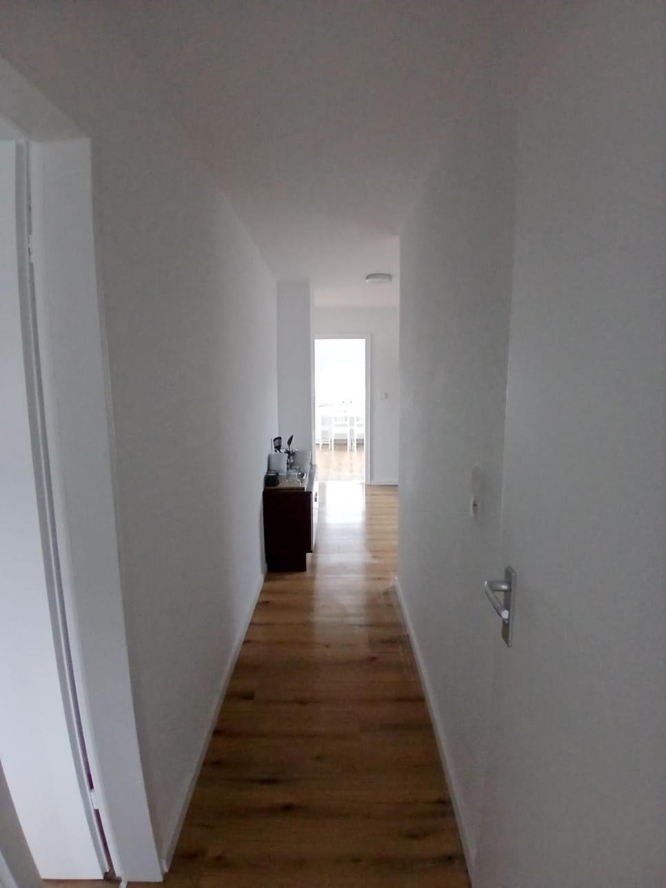 Three-Bedroom Apartment photo 1