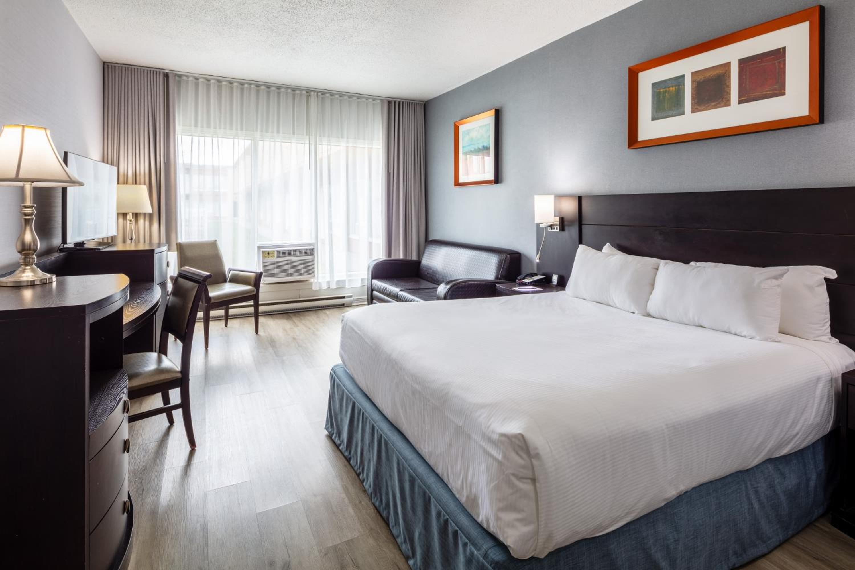 Deluxe Queen Room - Photo 8