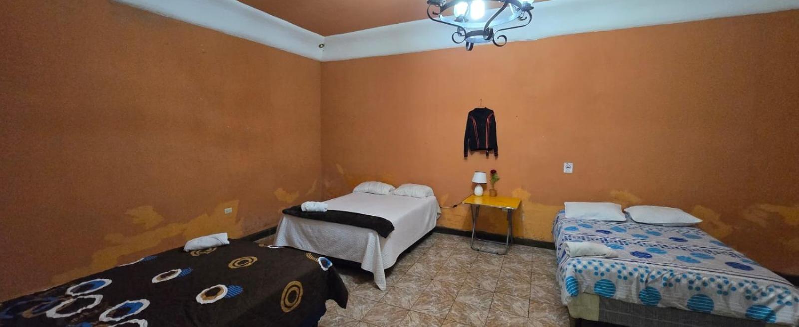 Basic Triple Room With Shared Bathroom photo 3