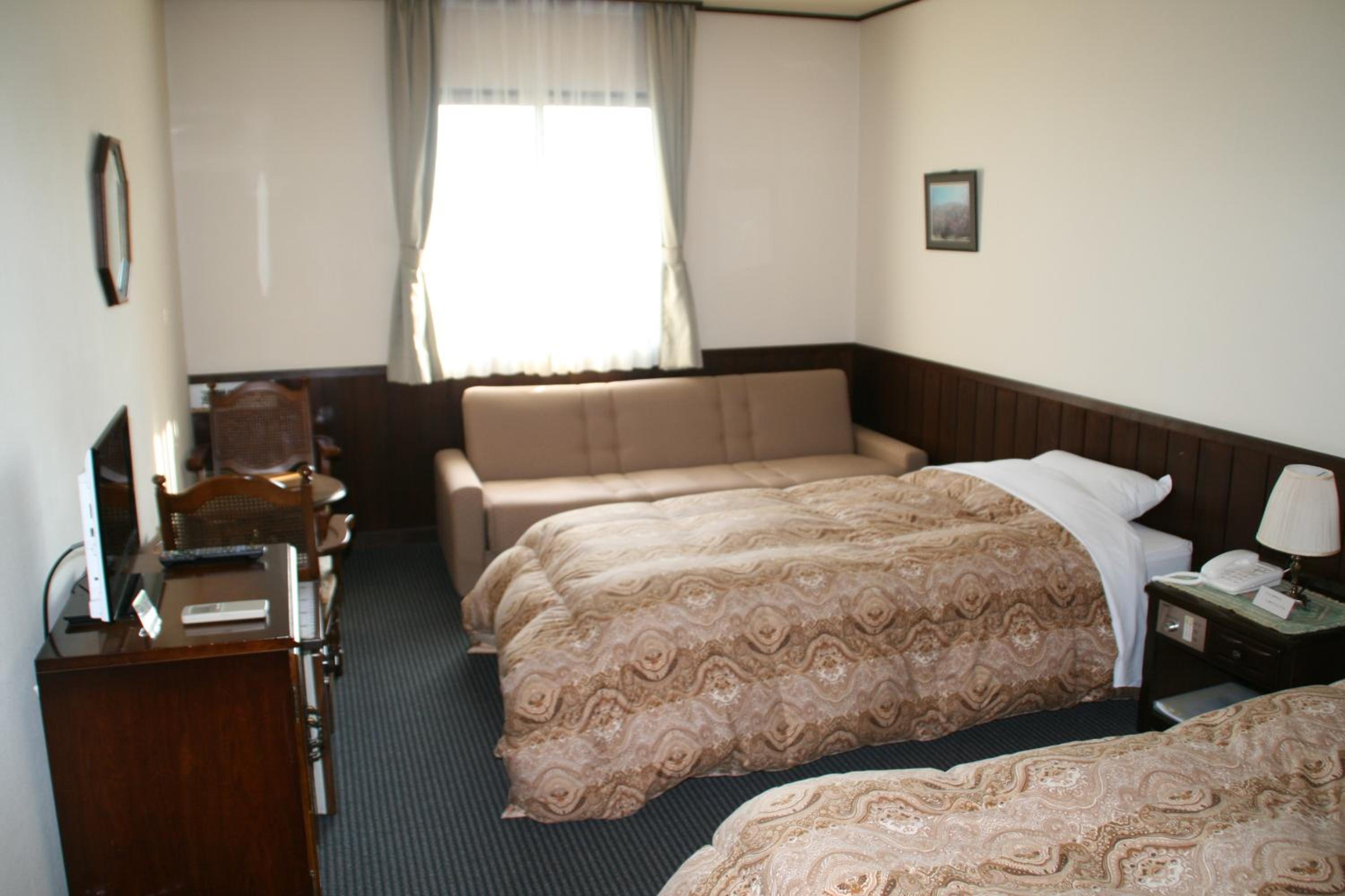 Twin Room - Photo 1