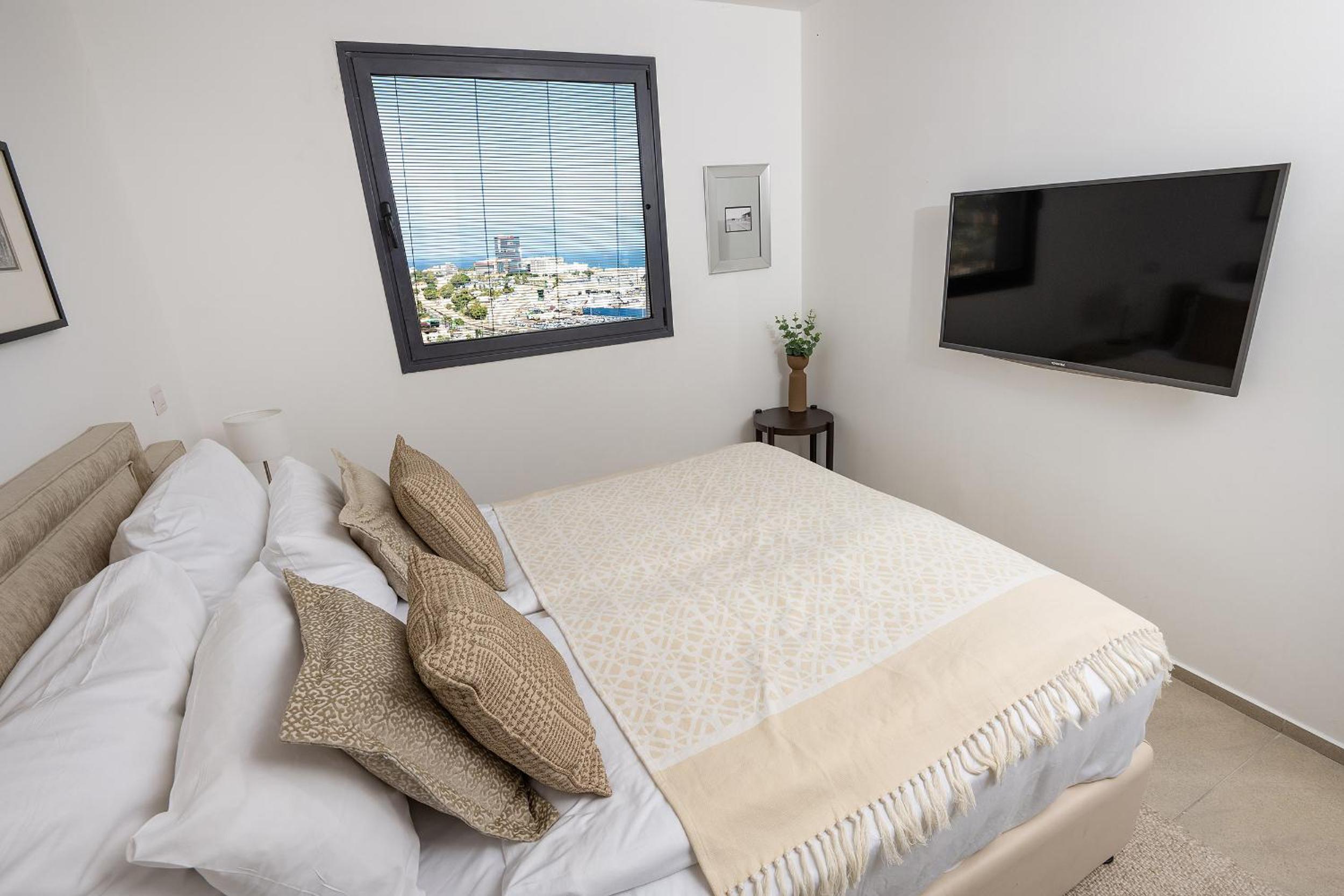 Four-Bedroom Apartment with Balcony 
