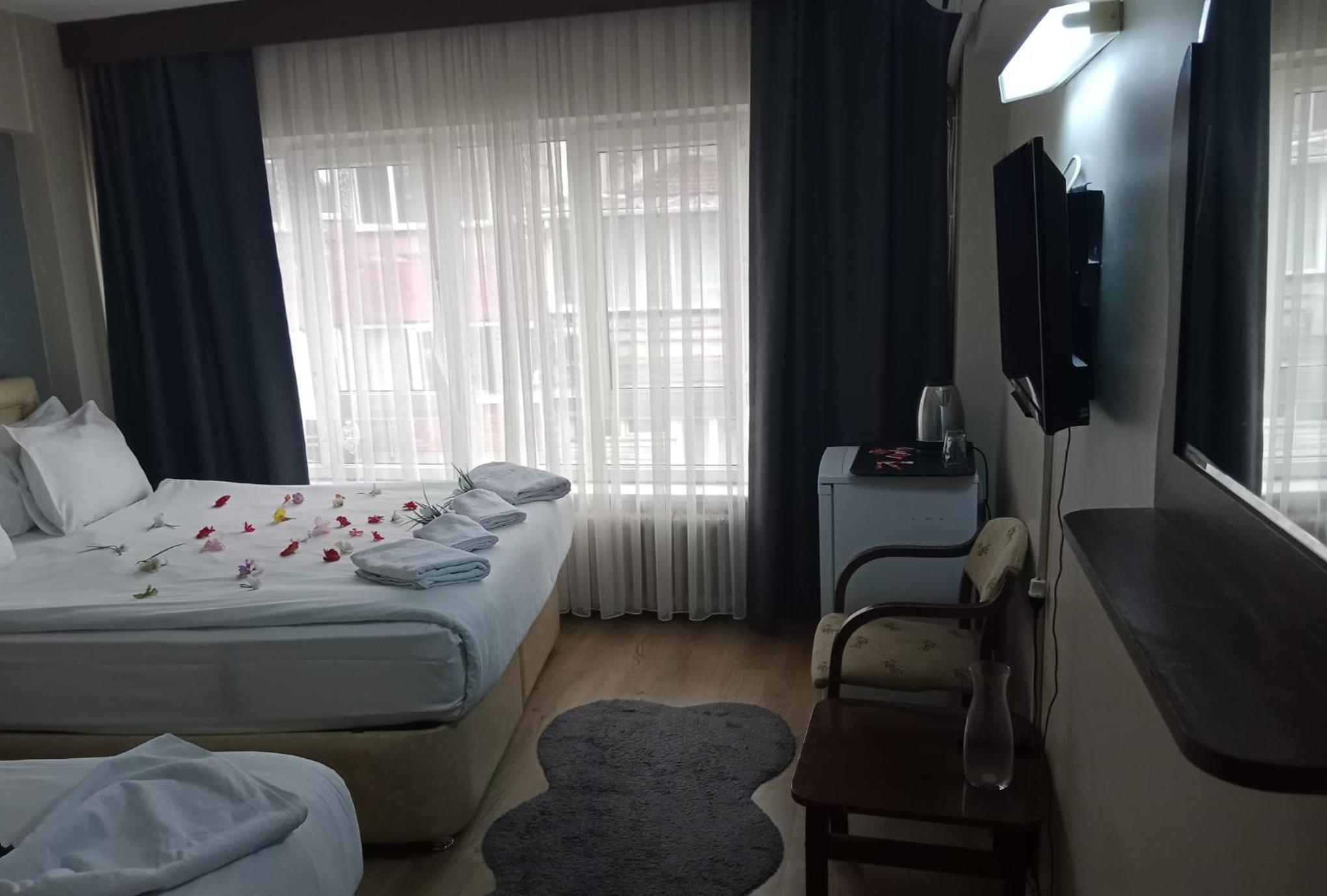 Triple Room - Photo 1