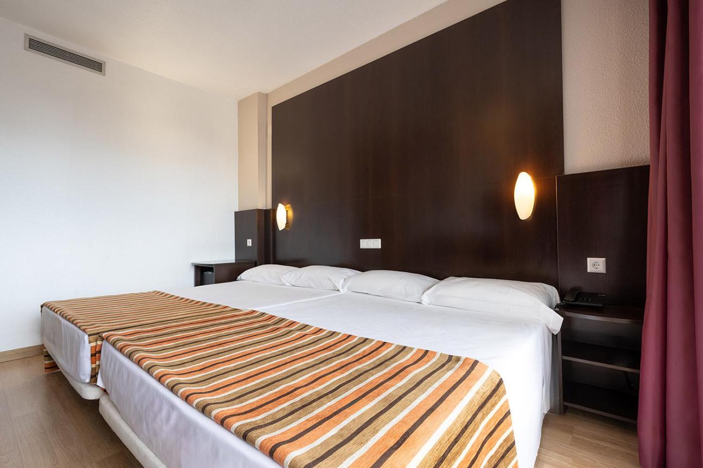 Double or Twin Room (3 Adults + 1 Child)