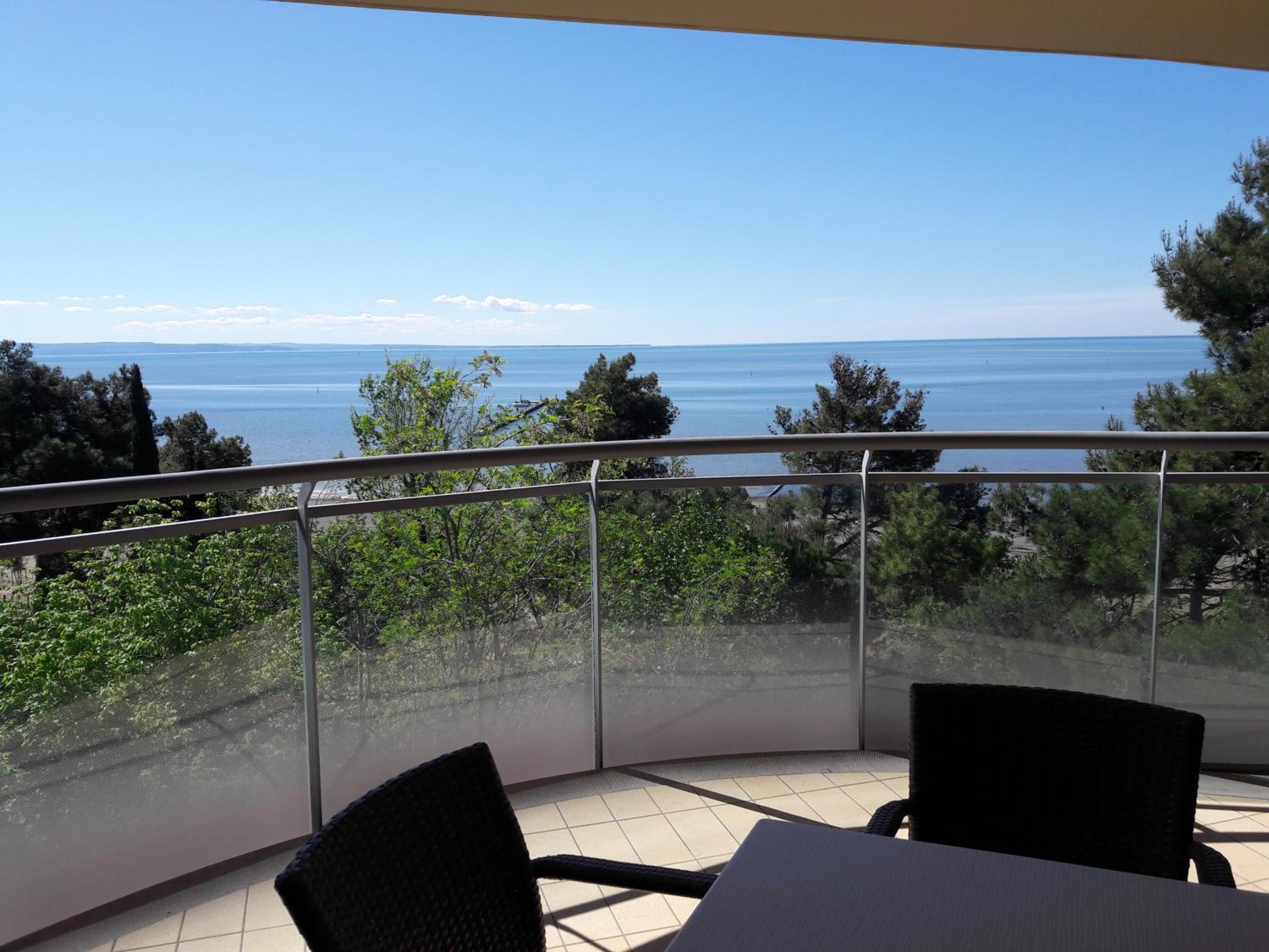 One-Bedroom Apartment with Balcony and Sea View