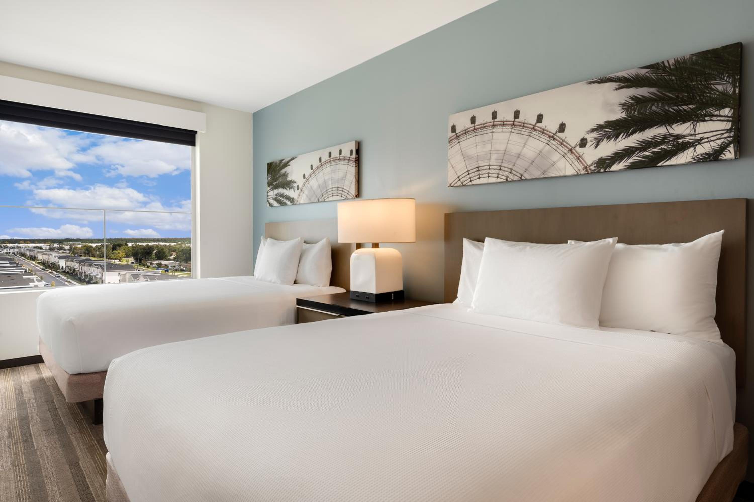 Two-Bedroom Suite with One King and Two Queen Beds with Kitchen and Sofa Bed thumbnail 6