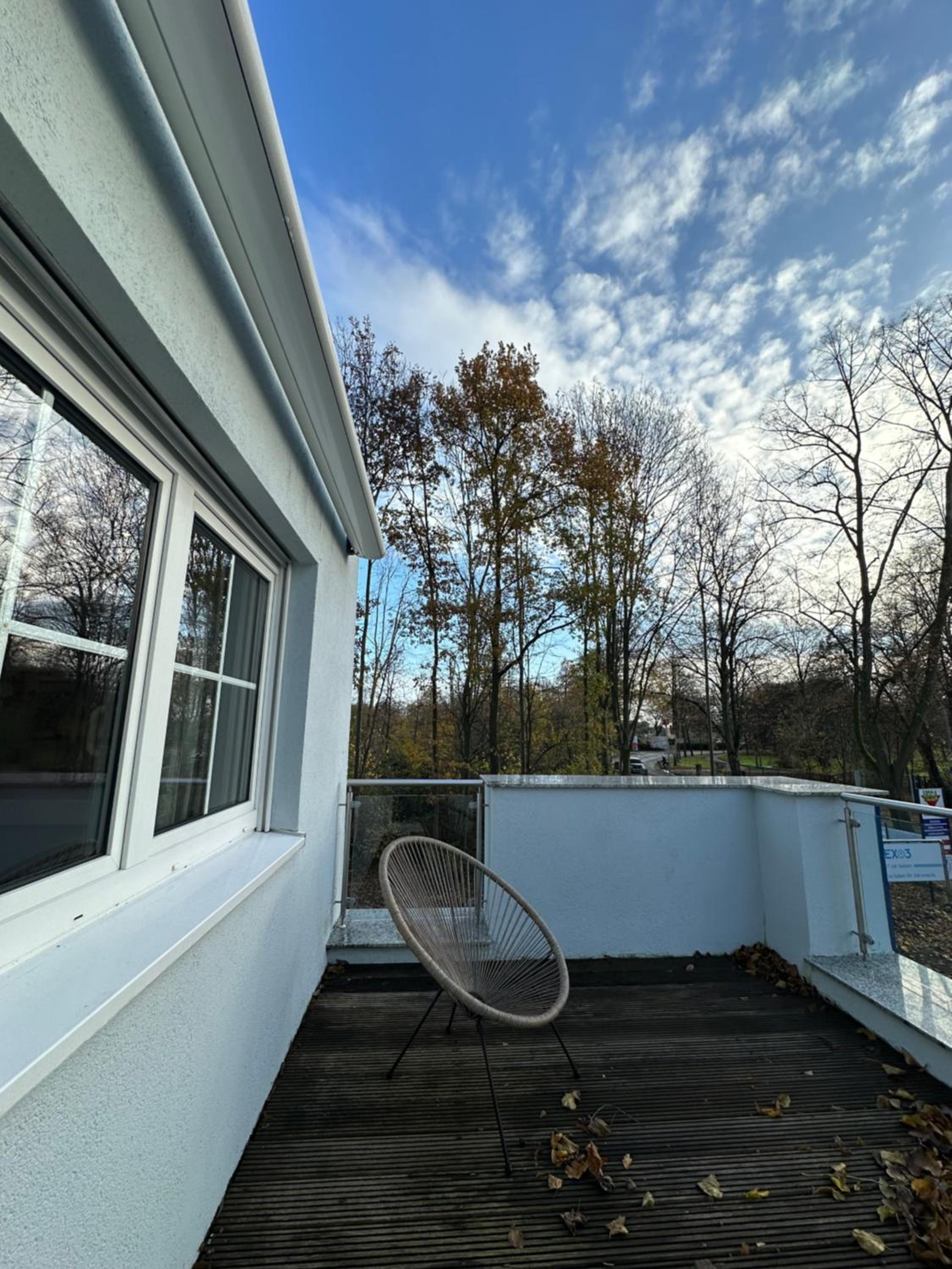 Three-Bedroom Apartment with Balcony photo 2