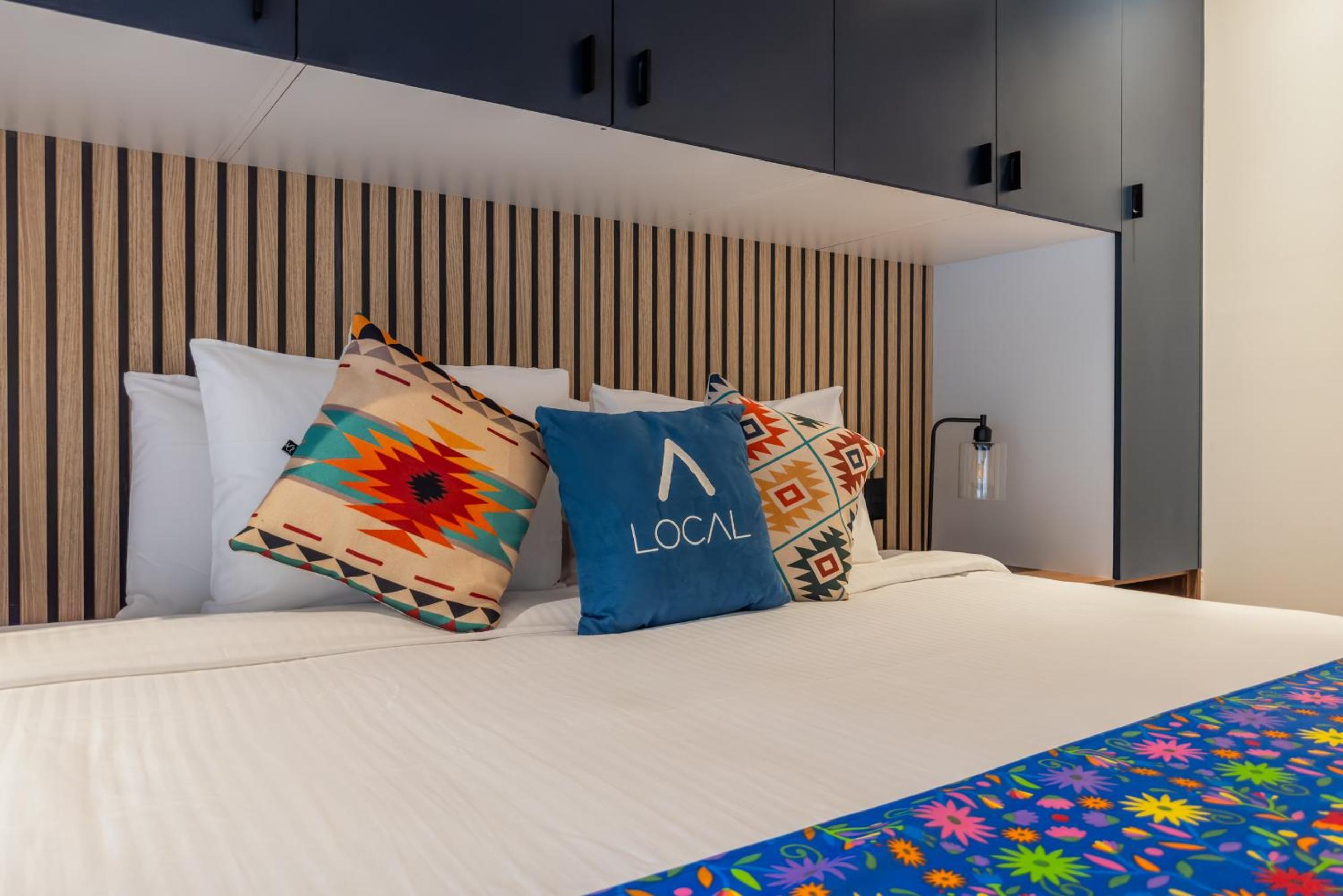 Standard room with kitchenette and balcony