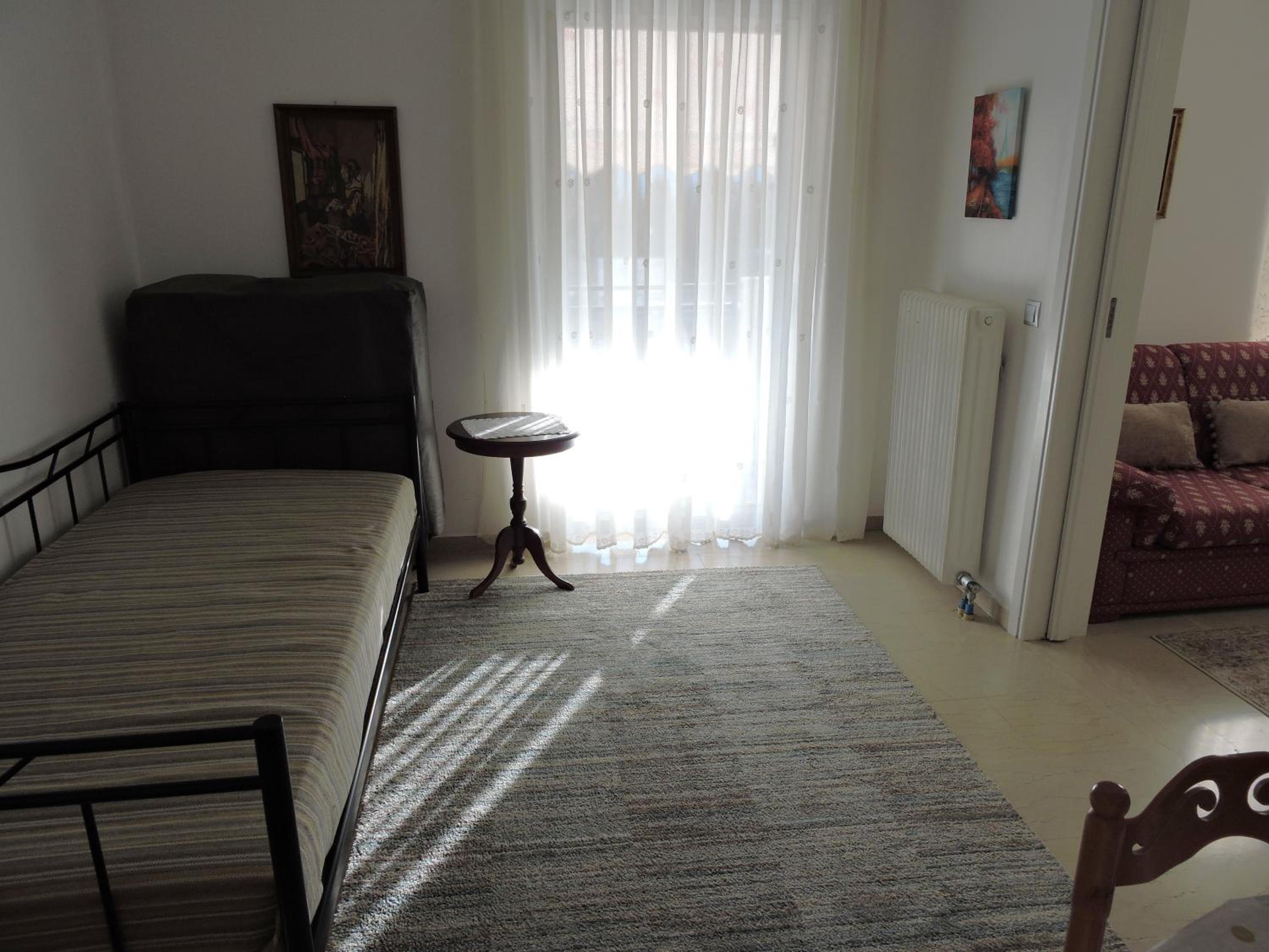 Three-Bedroom Apartment - Photo 16