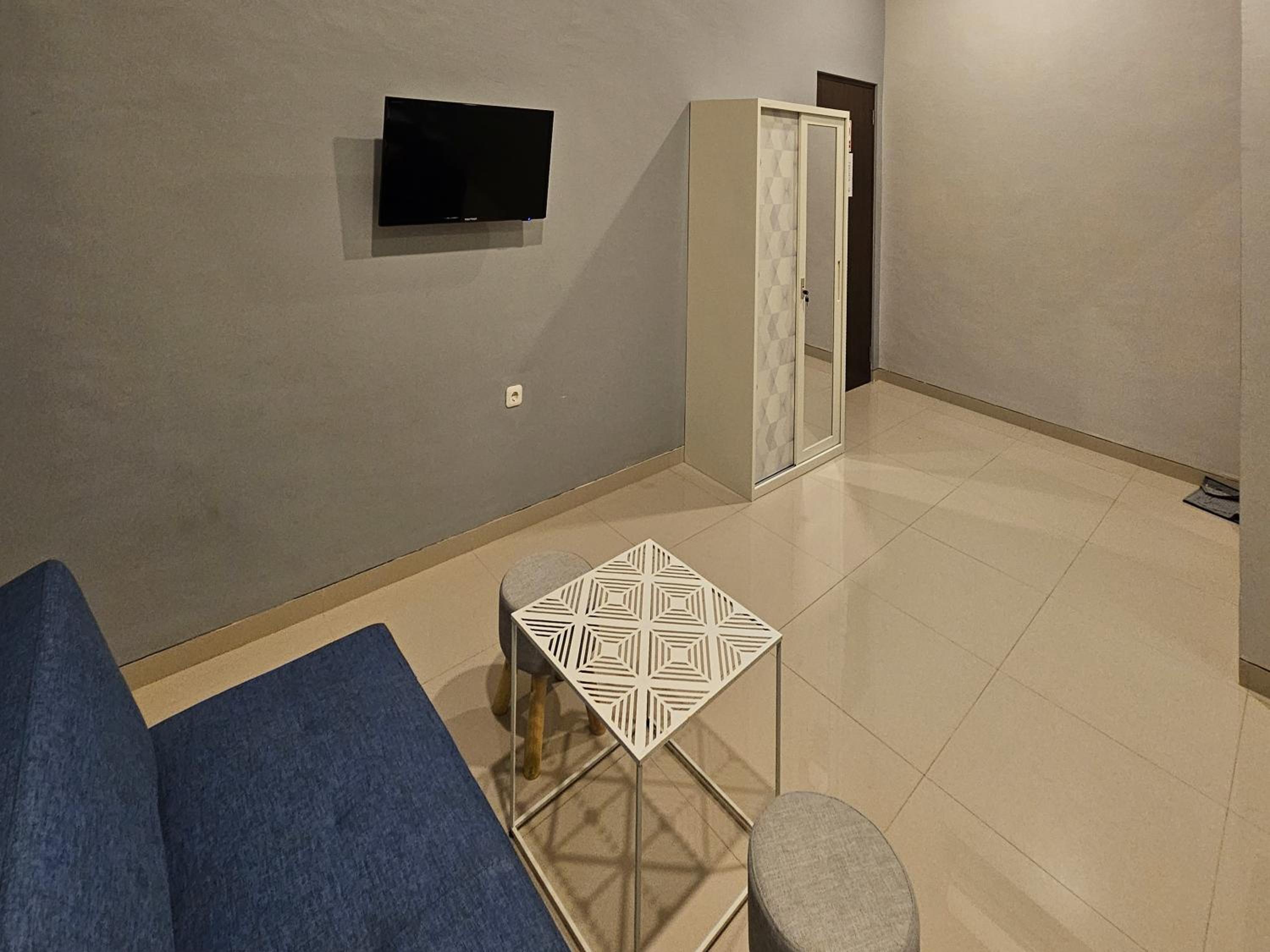 Deluxe Room - Photo 17