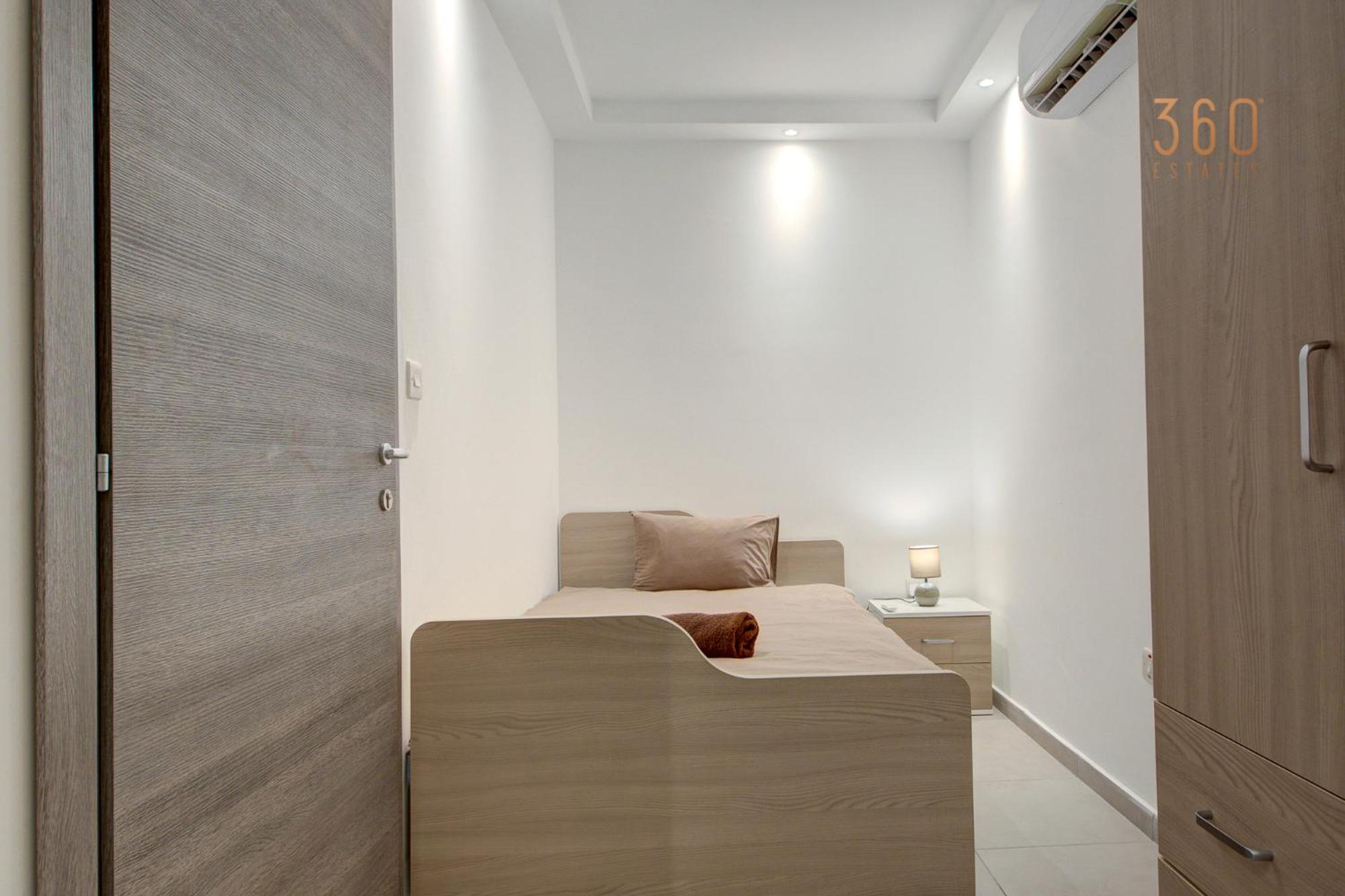 Three-Bedroom Apartment photo 1