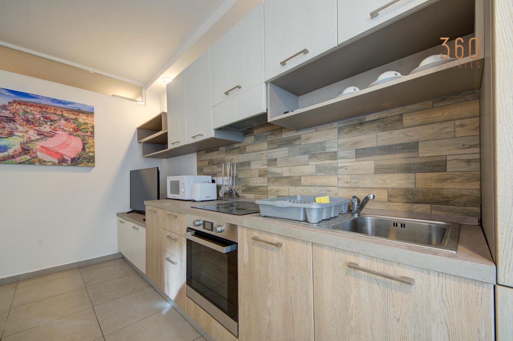 Three-Bedroom Apartment photo 2