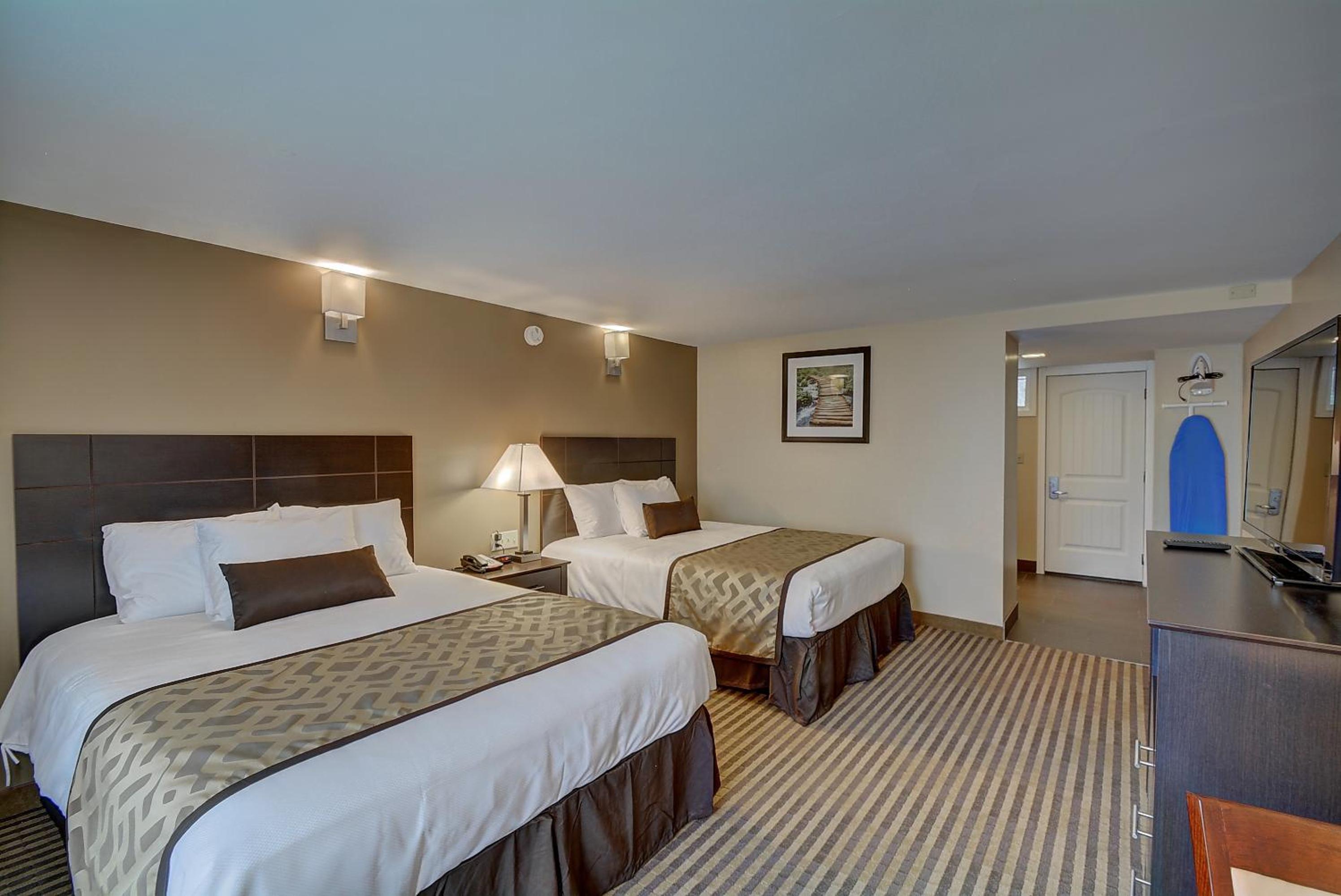 Queen Room with Two Queen Beds - Photo 1