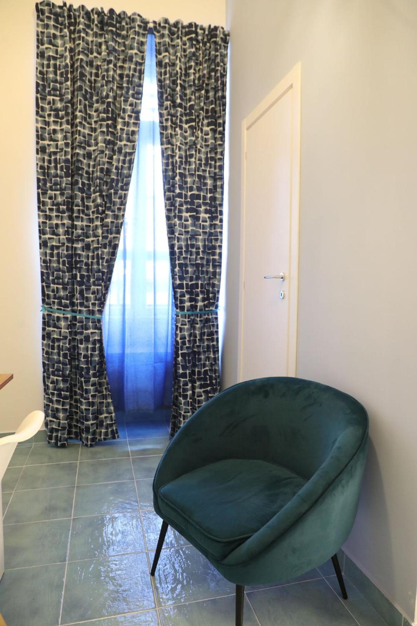 Quadruple Room with Private Bathroom